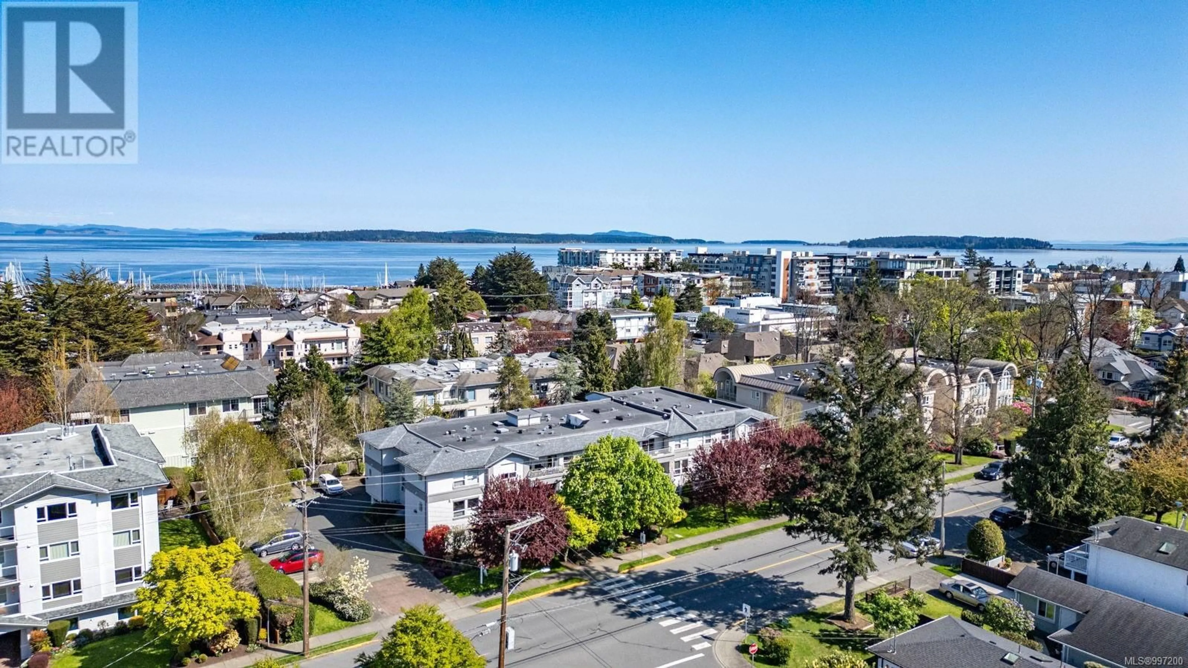 A pic from outside/outdoor area/front of a property/back of a property/a pic from drone, water/lake/river/ocean view for 206 - 9945 FIFTH STREET, Sidney British Columbia V8L2V6