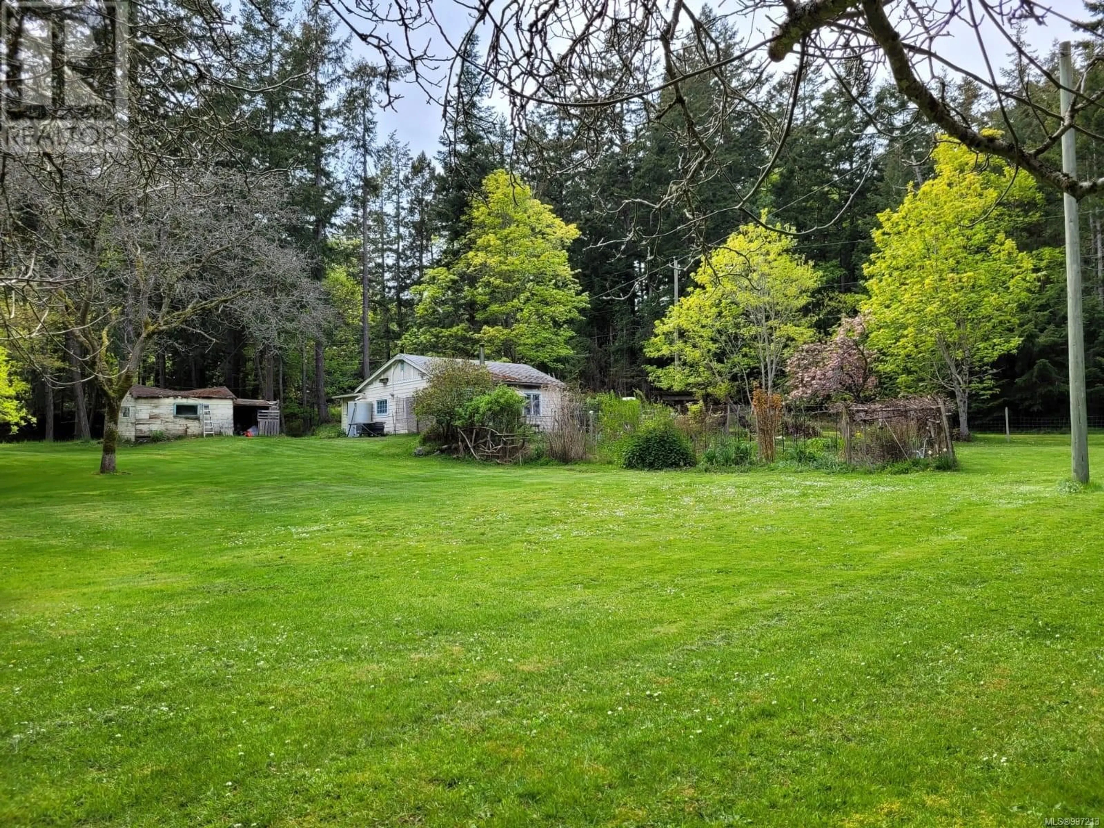 A pic from outside/outdoor area/front of a property/back of a property/a pic from drone, forest/trees view for 4218 ARMADALE ROAD, Pender Island British Columbia V0N2M1