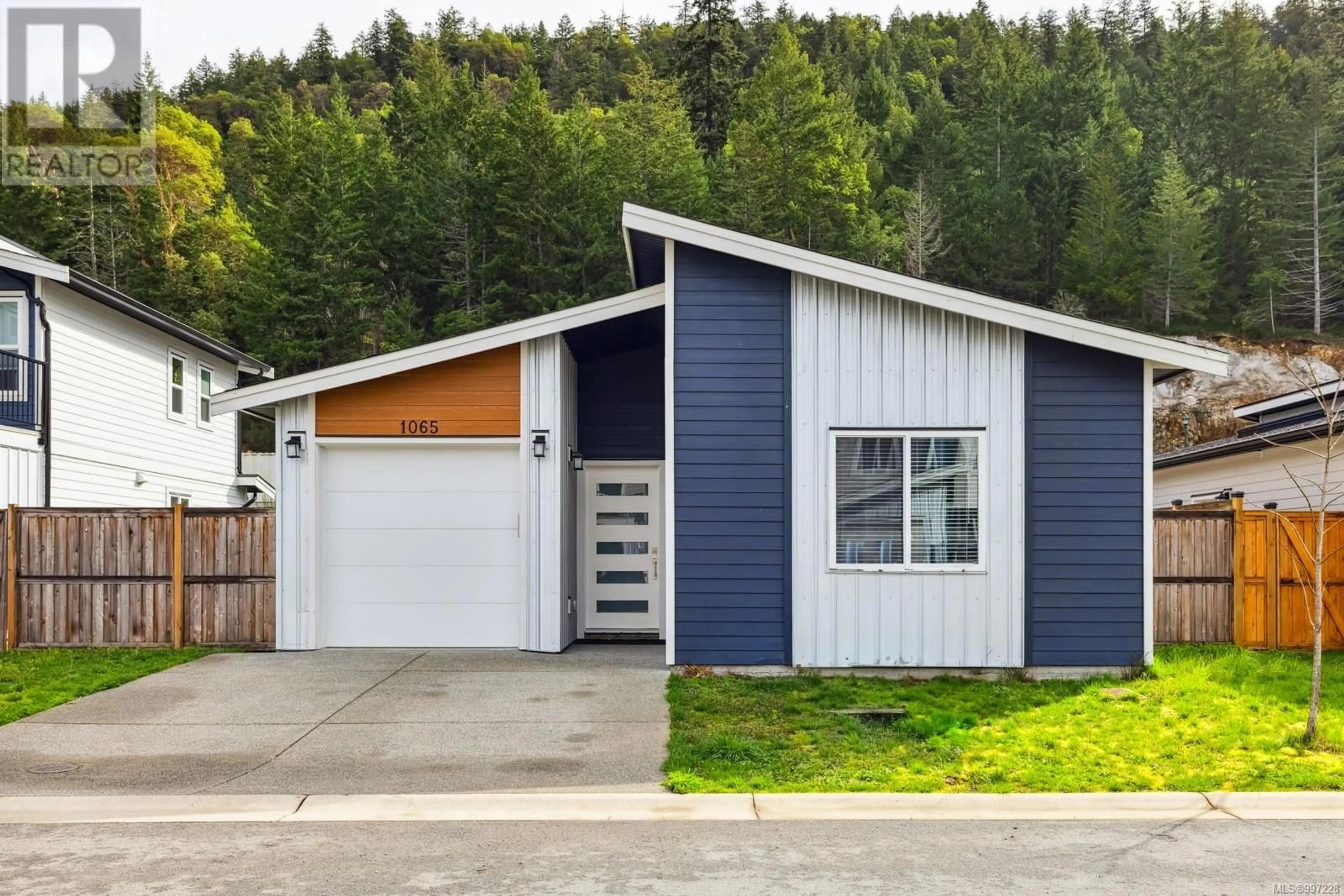 Home with vinyl exterior material, street for 1065 GAMMON WAY, Shawnigan Lake British Columbia V0R2W3