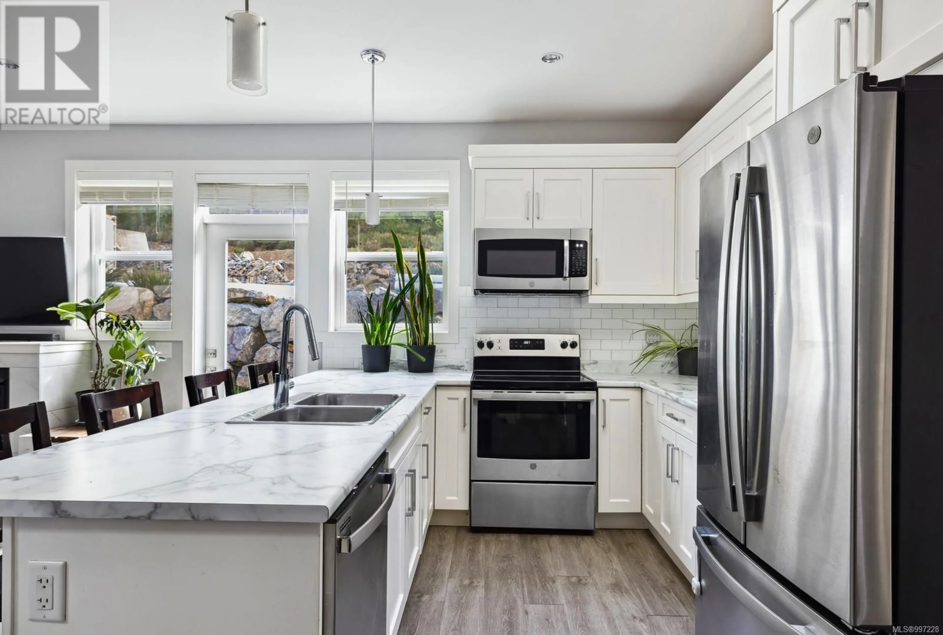 Open concept kitchen, ceramic/tile floor for 1065 GAMMON WAY, Shawnigan Lake British Columbia V0R2W3