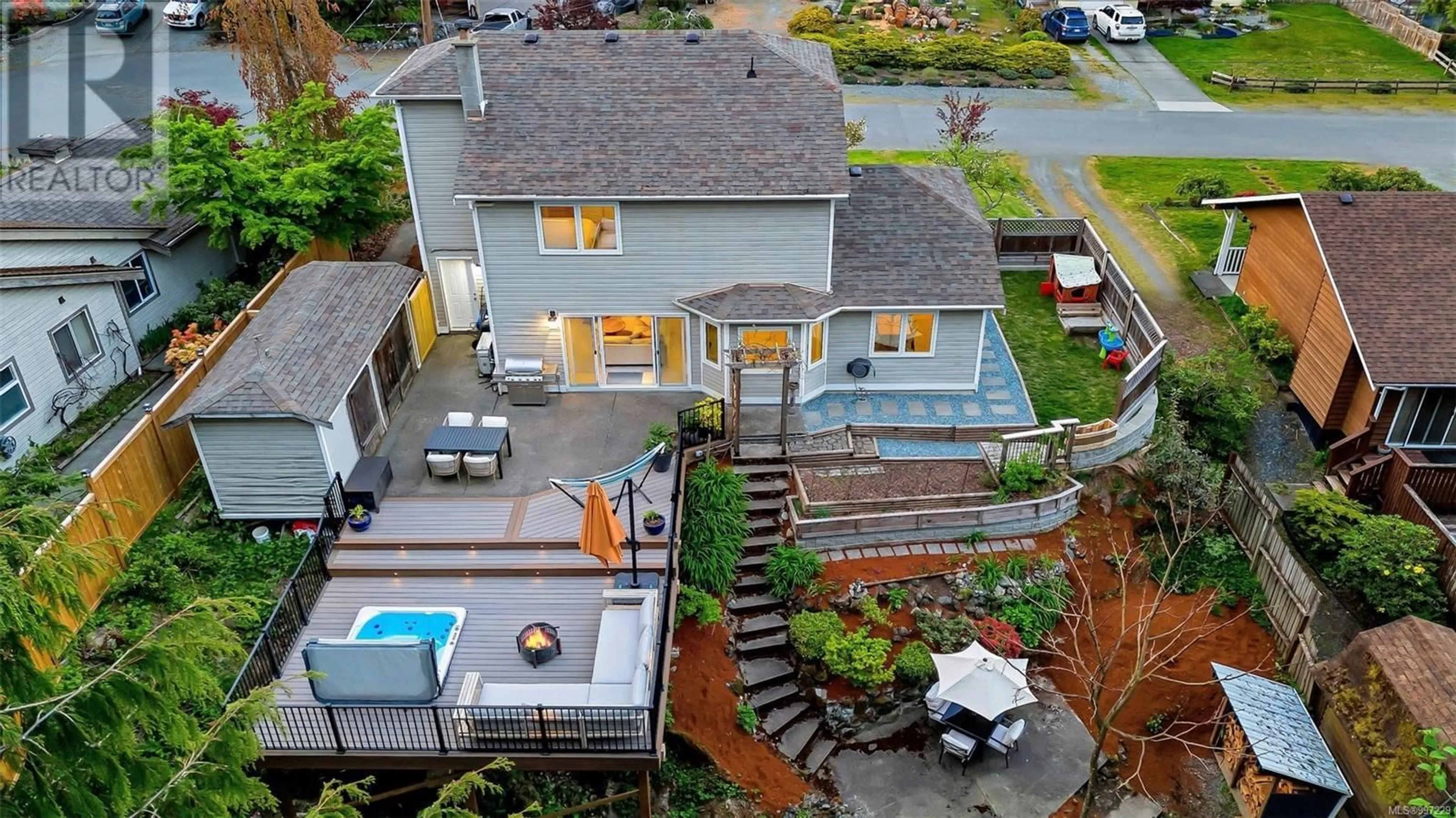 A pic from outside/outdoor area/front of a property/back of a property/a pic from drone, street for 2364 LARSEN ROAD, Shawnigan Lake British Columbia V0R2W0