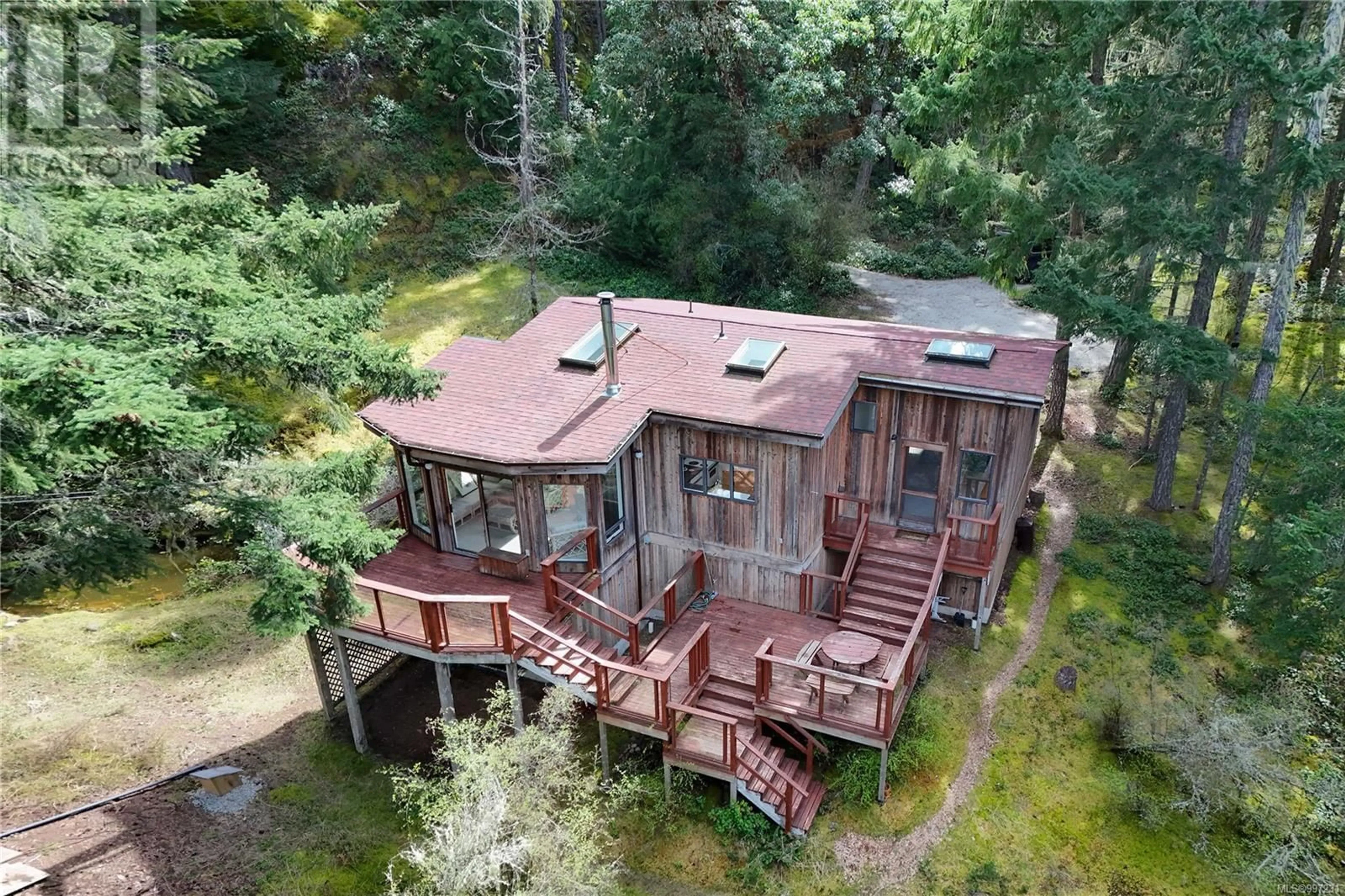A pic from outside/outdoor area/front of a property/back of a property/a pic from drone, unknown for 631 MT. BELCHER HEIGHTS, Salt Spring British Columbia V8K2J3