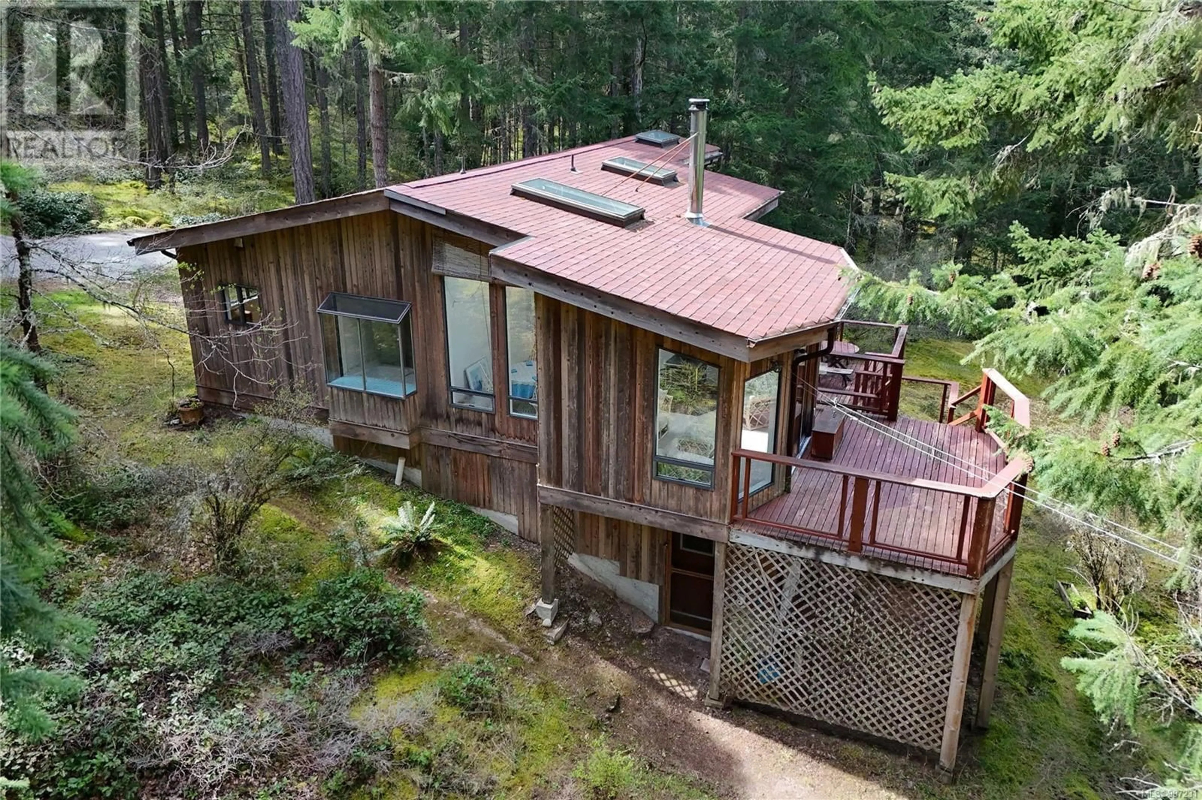 A pic from outside/outdoor area/front of a property/back of a property/a pic from drone, forest/trees view for 631 MT. BELCHER HEIGHTS, Salt Spring British Columbia V8K2J3