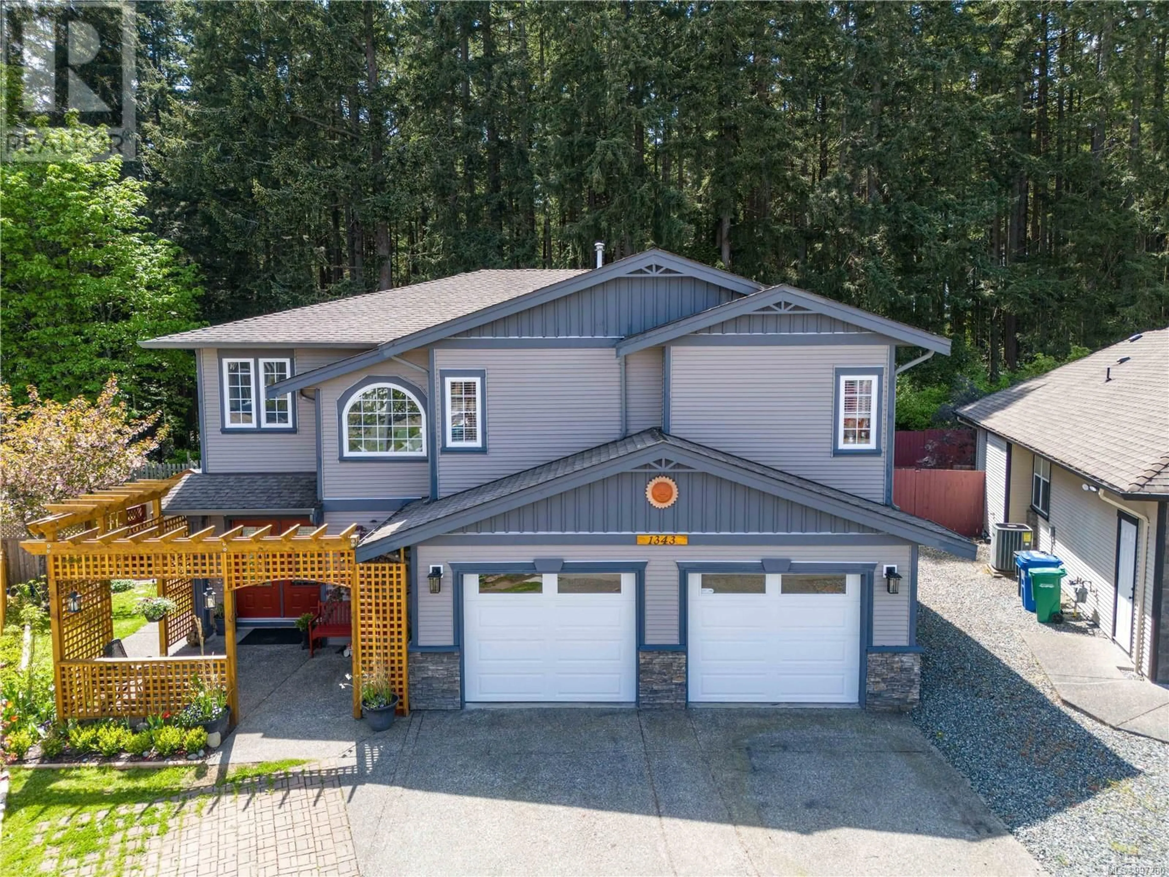 A pic from outside/outdoor area/front of a property/back of a property/a pic from drone, street for 1343 THALIA PLACE, Nanaimo British Columbia V9R7E1