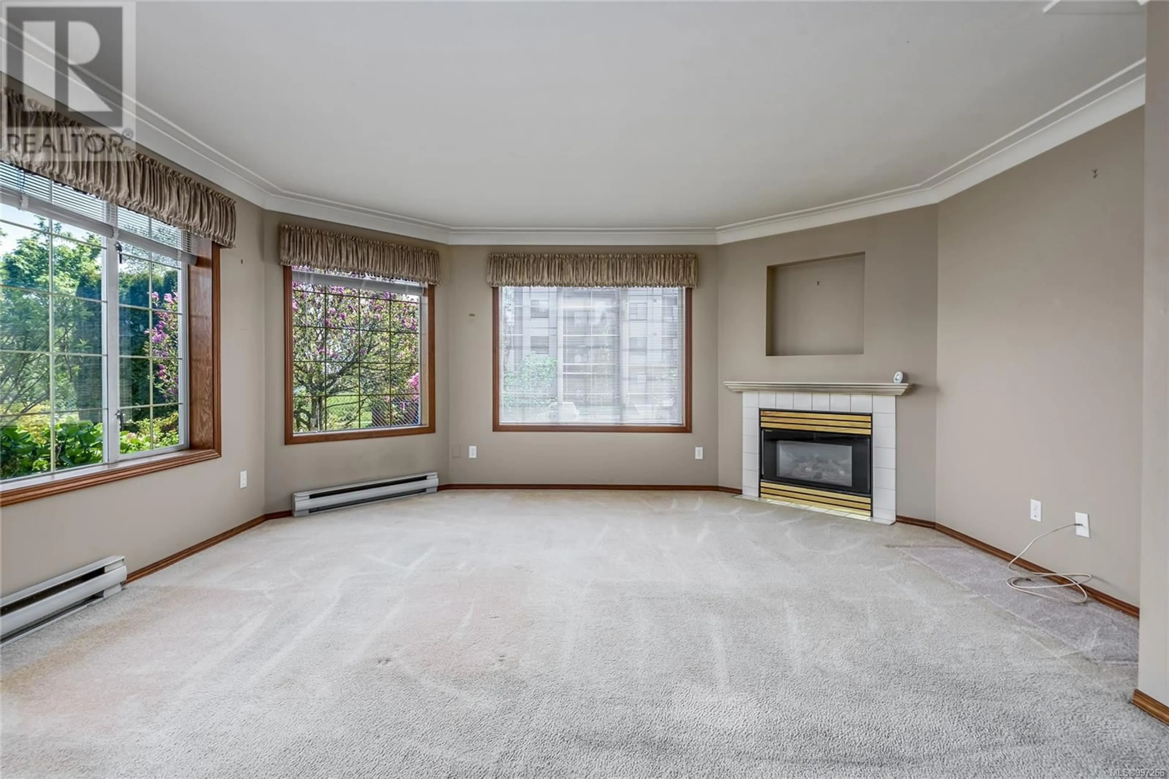 Living room with furniture, ceramic/tile floor for 202 - 1830 RIVERSIDE LANE, Courtenay British Columbia V9N8C7