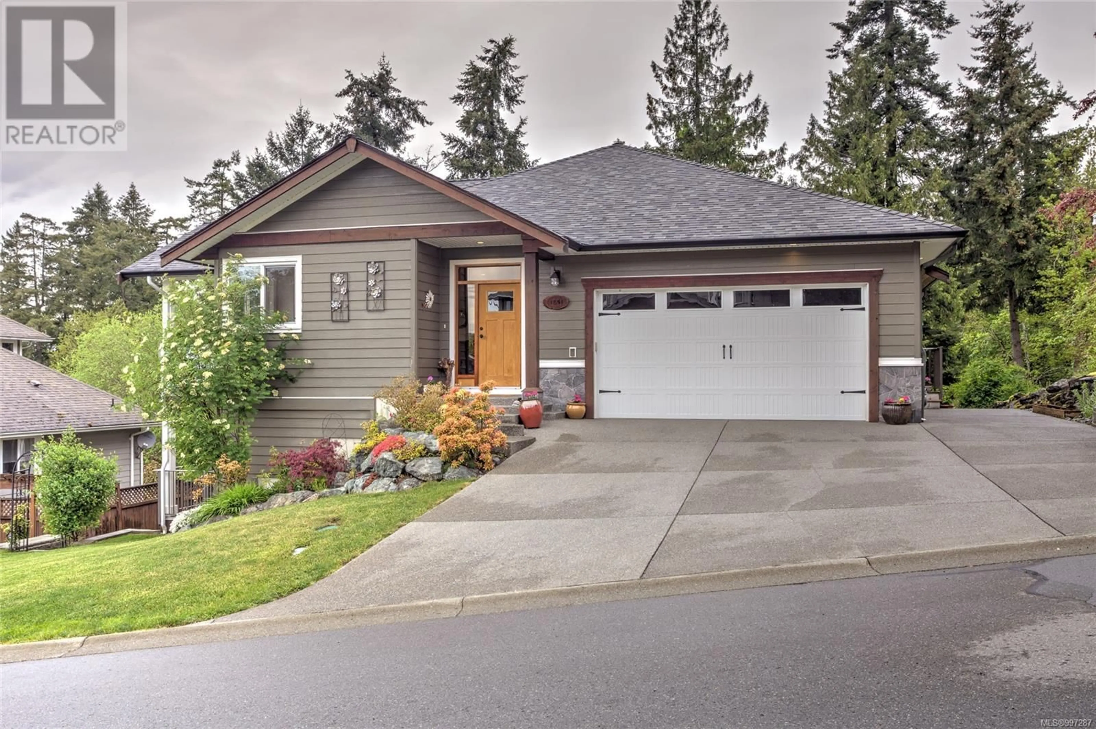 Home with vinyl exterior material, street for 1851 STERLING RIDGE PLACE, Duncan British Columbia V9L5N2