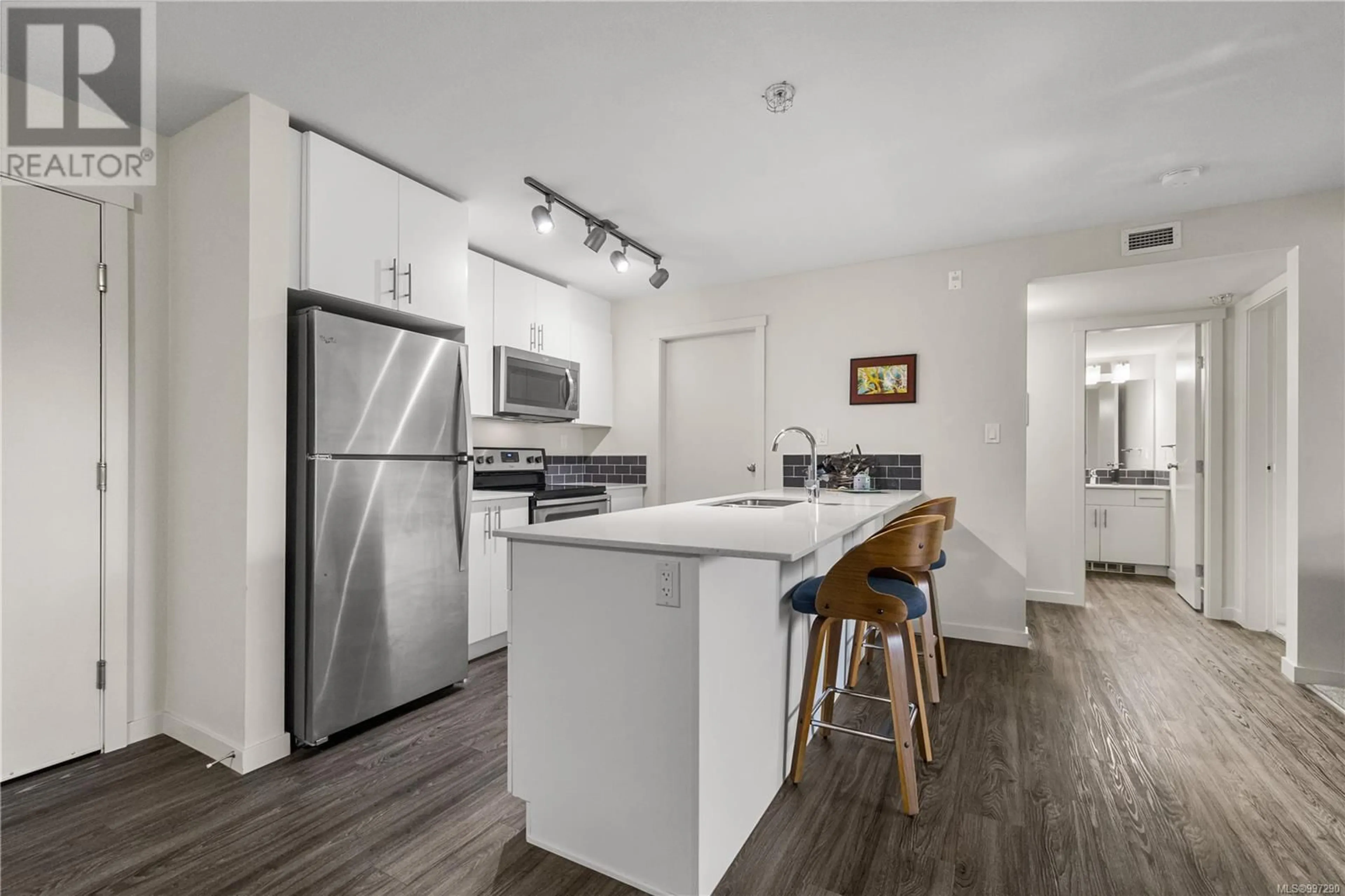 Open concept kitchen, unknown for 202 - 1944 RIVERSIDE LANE, Courtenay British Columbia V9N0E5