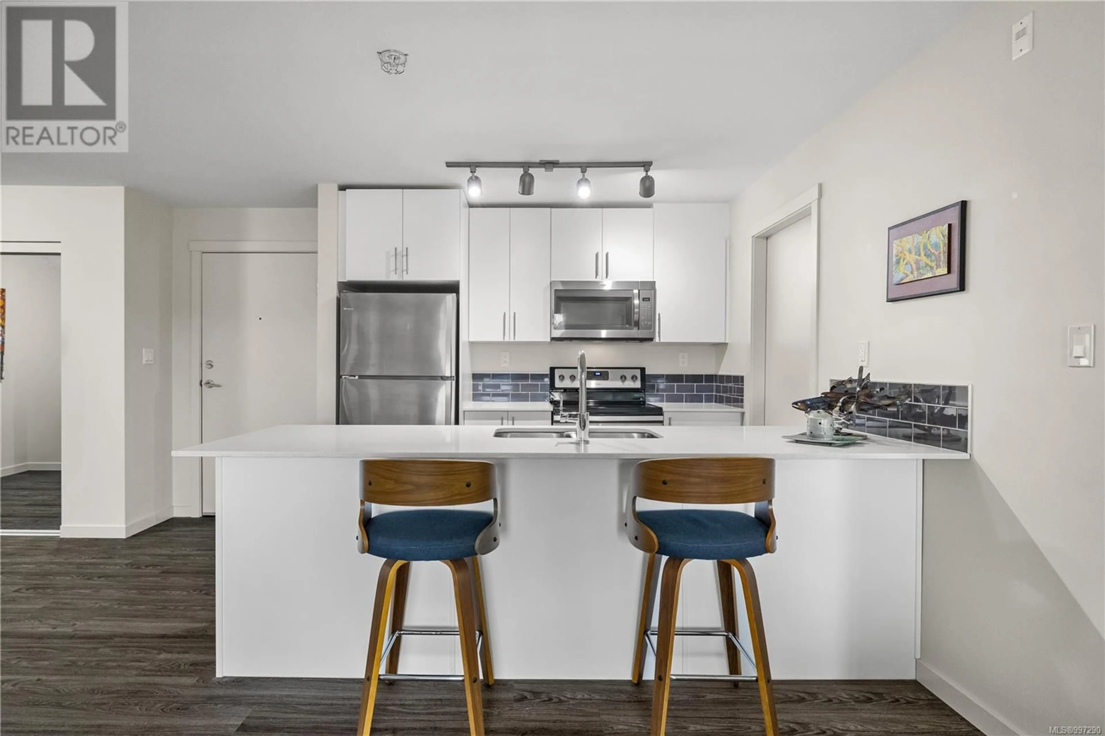 Open concept kitchen, unknown for 202 - 1944 RIVERSIDE LANE, Courtenay British Columbia V9N0E5