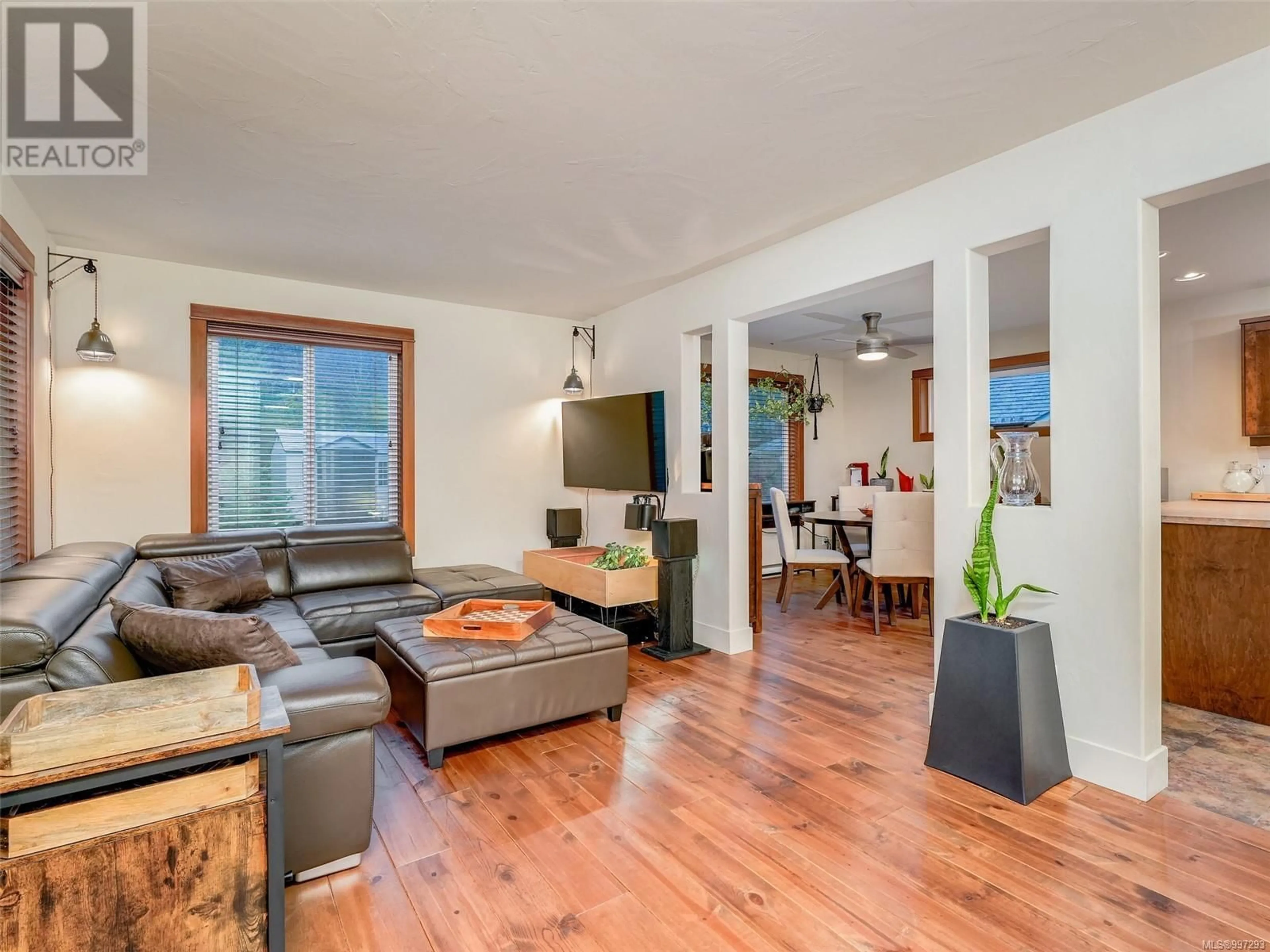 Living room with furniture, wood/laminate floor for 3369 SEWELL LANE, Colwood British Columbia V9C0C1