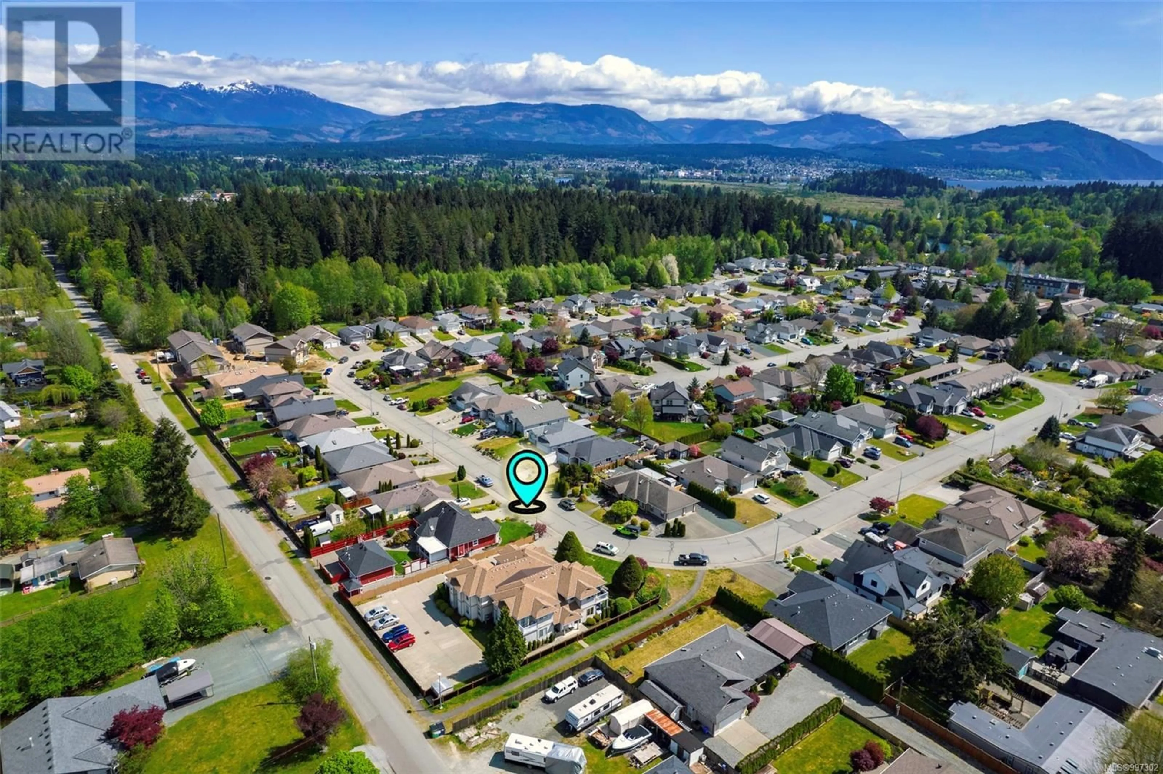 A pic from outside/outdoor area/front of a property/back of a property/a pic from drone, mountain view for 5570 WOODLAND CRESCENT, Port Alberni British Columbia V9Y8E6