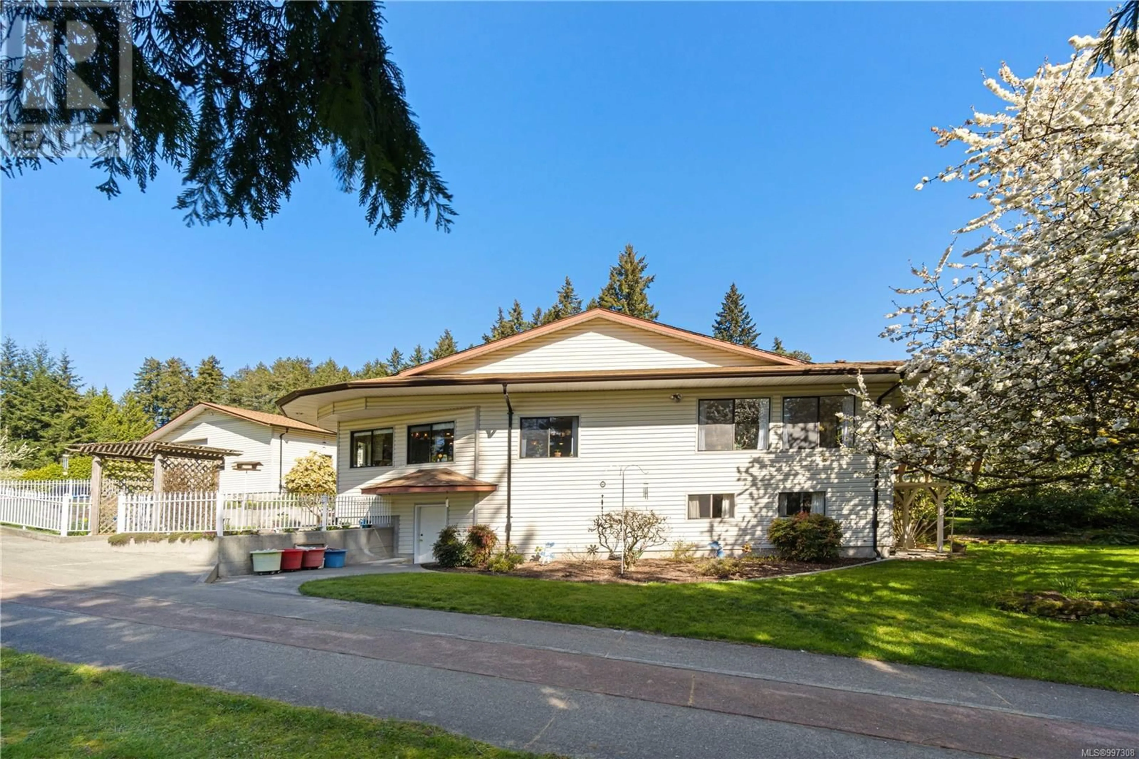 Home with vinyl exterior material, street for 2369 SOUTH WELLINGTON ROAD, Nanaimo British Columbia V9X1S4