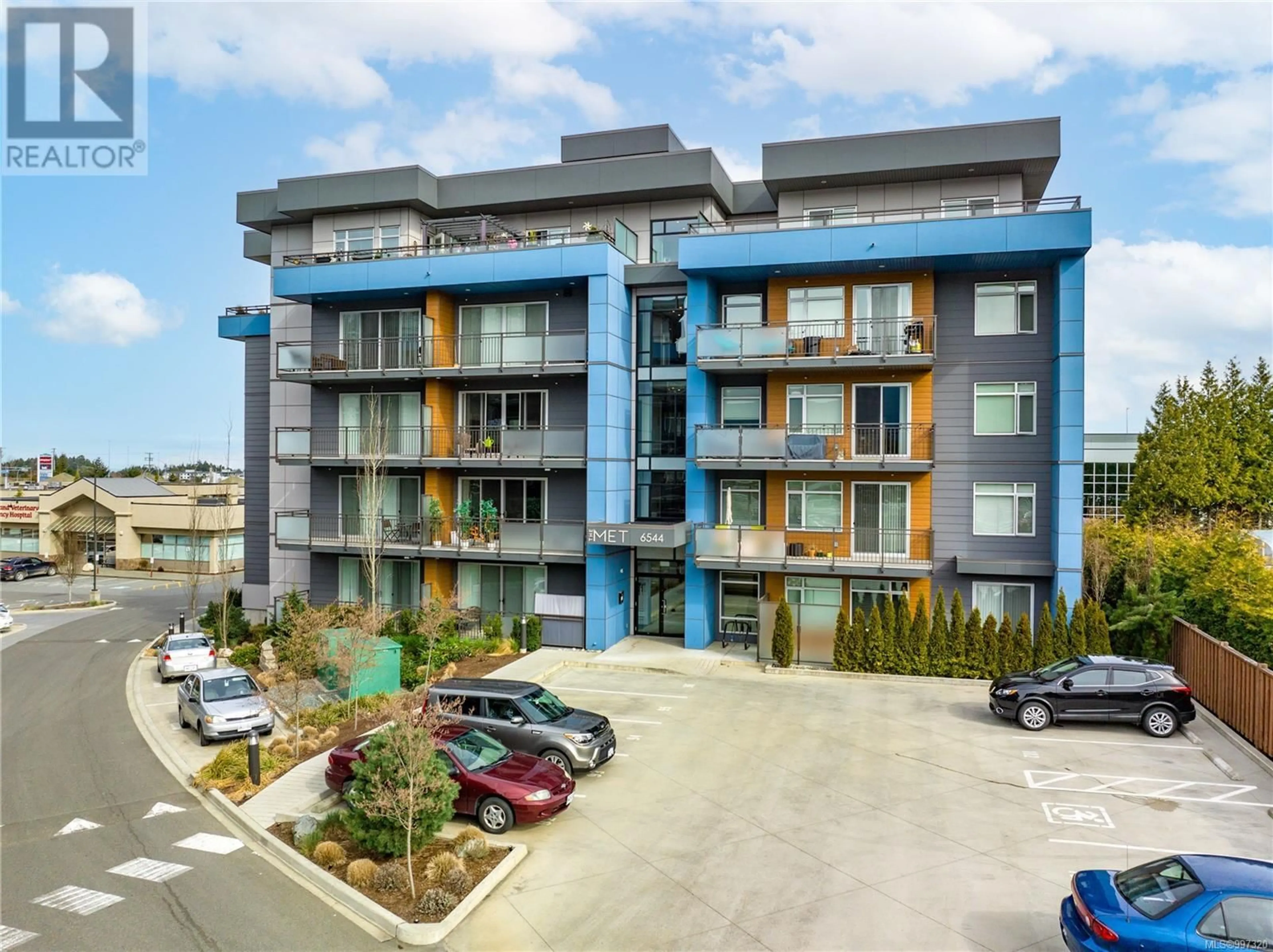 A pic from outside/outdoor area/front of a property/back of a property/a pic from drone, unknown for 501 - 6544 METRAL DRIVE, Nanaimo British Columbia V9T2L8