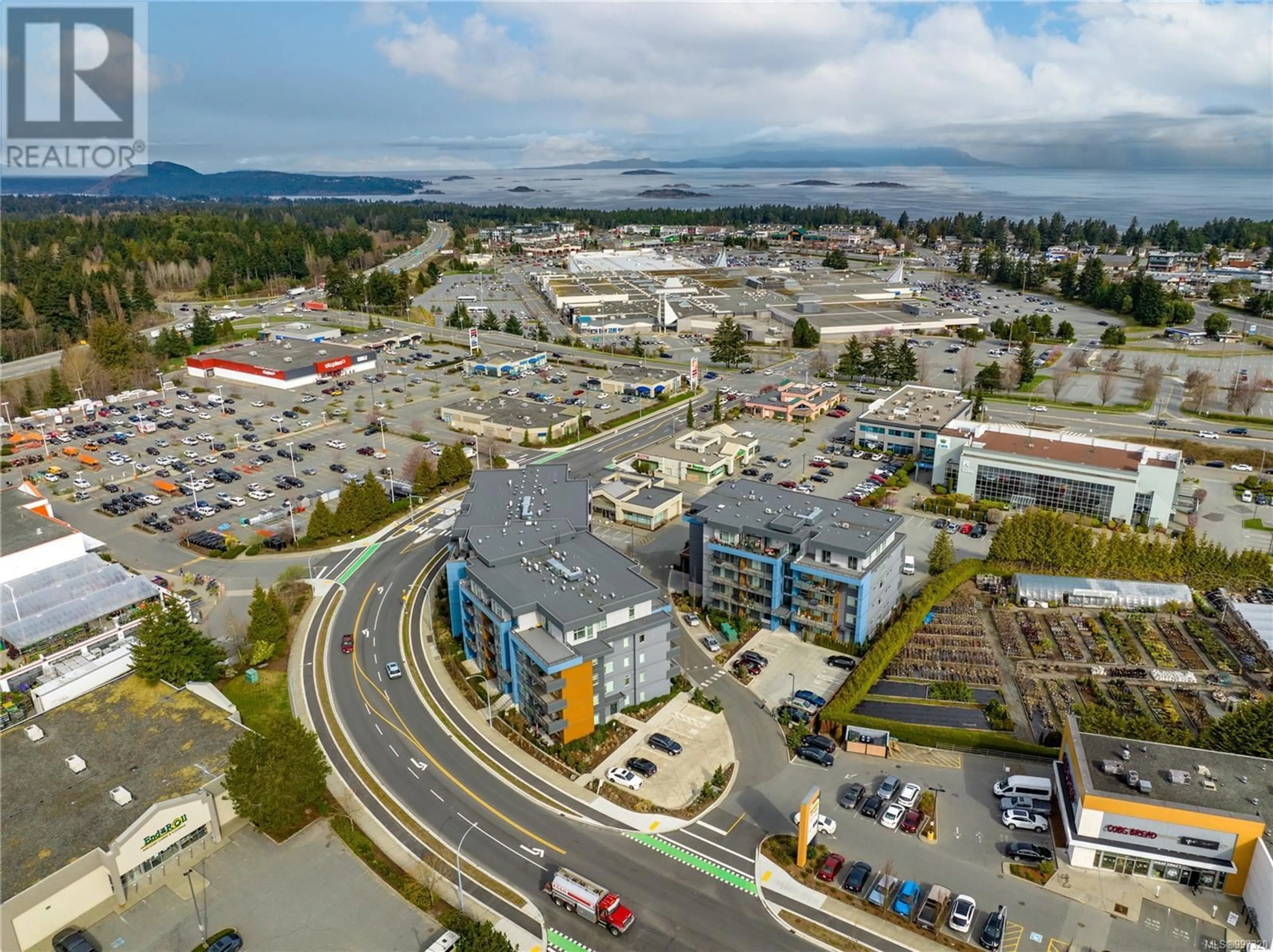 A pic from outside/outdoor area/front of a property/back of a property/a pic from drone, unknown for 501 - 6544 METRAL DRIVE, Nanaimo British Columbia V9T2L8