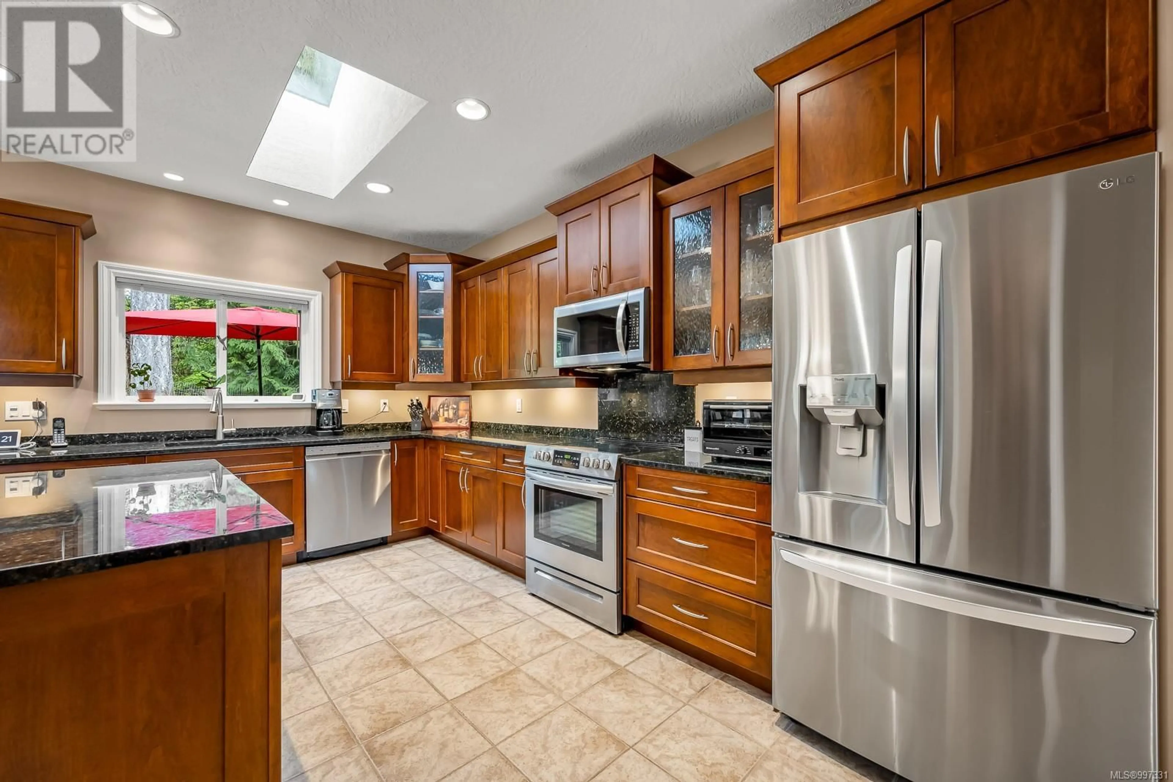Open concept kitchen, ceramic/tile floor for 6503 WALKER FRONTAGE ROAD, Fanny Bay British Columbia V0R1W0