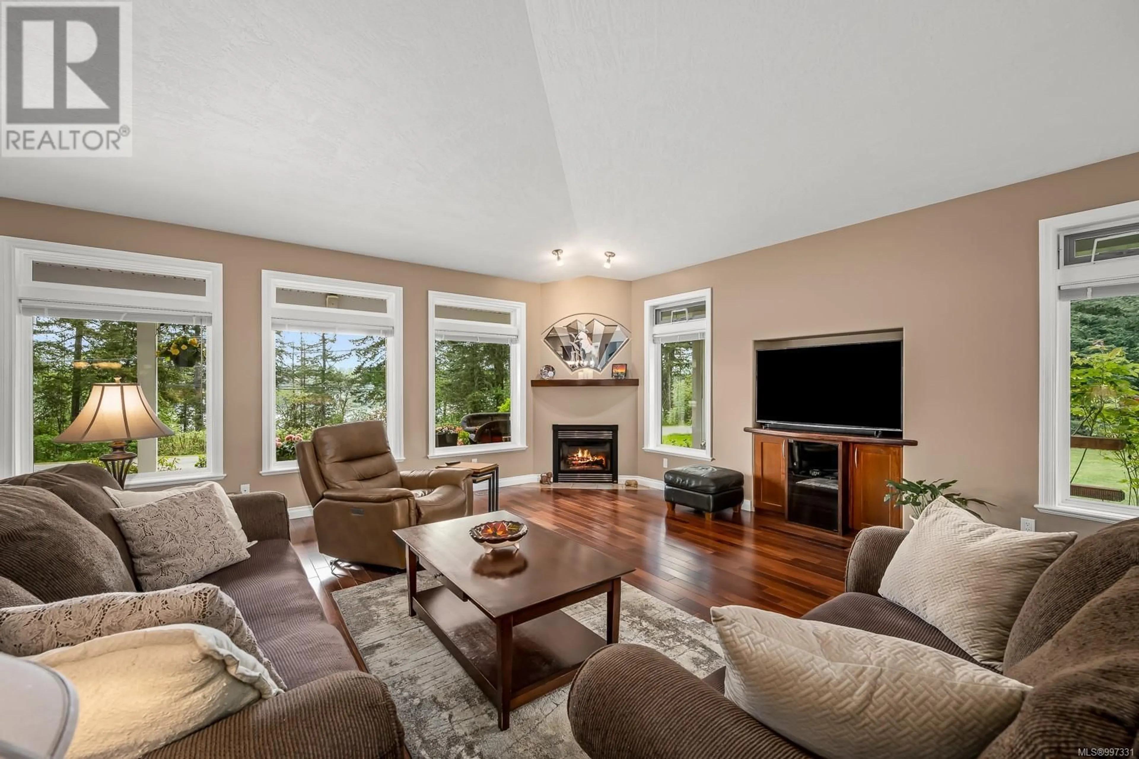 Living room with furniture, unknown for 6503 WALKER FRONTAGE ROAD, Fanny Bay British Columbia V0R1W0