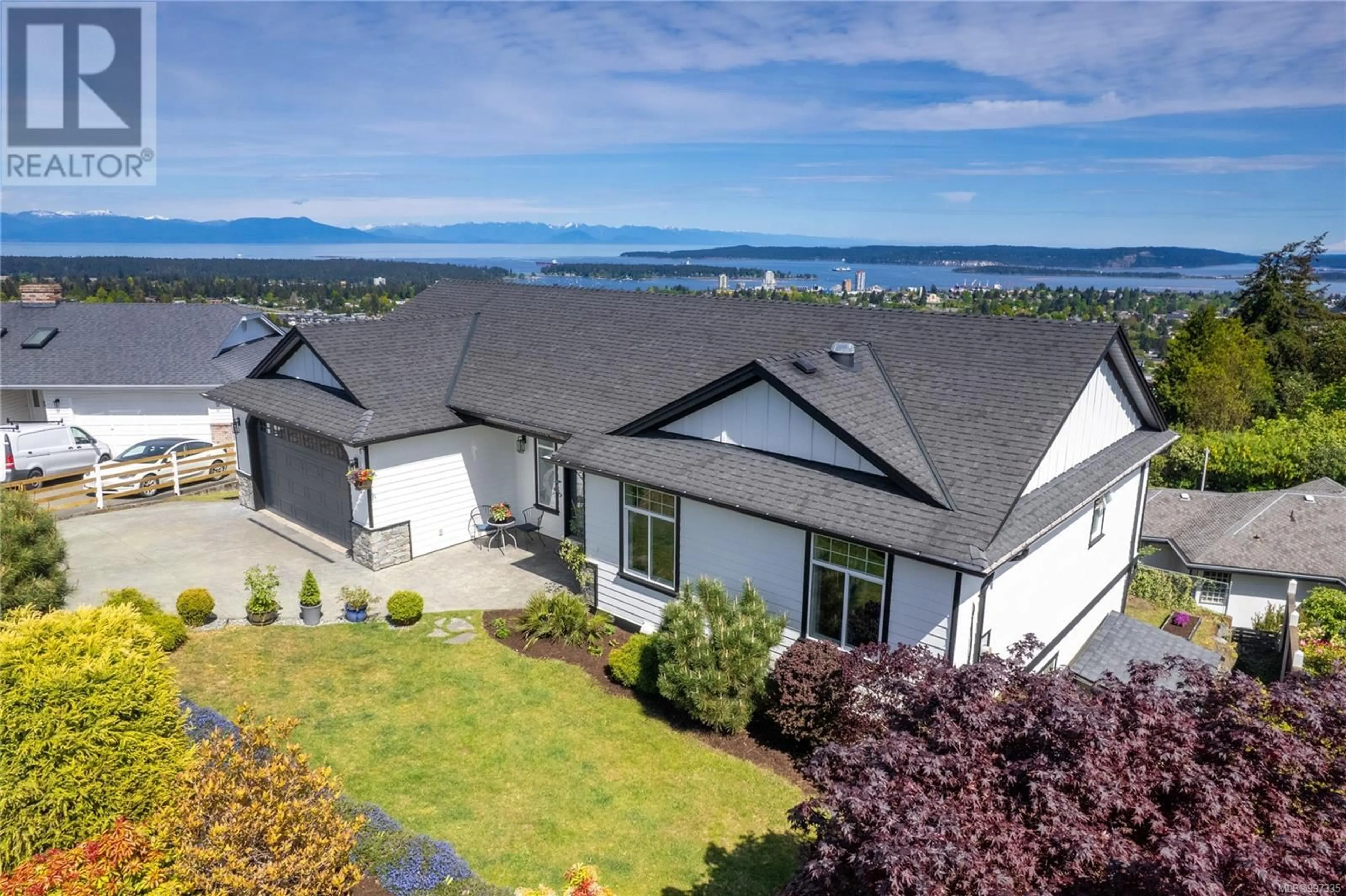 A pic from outside/outdoor area/front of a property/back of a property/a pic from drone, mountain view for 210 CONCORDIA PLACE, Nanaimo British Columbia V9R6A9