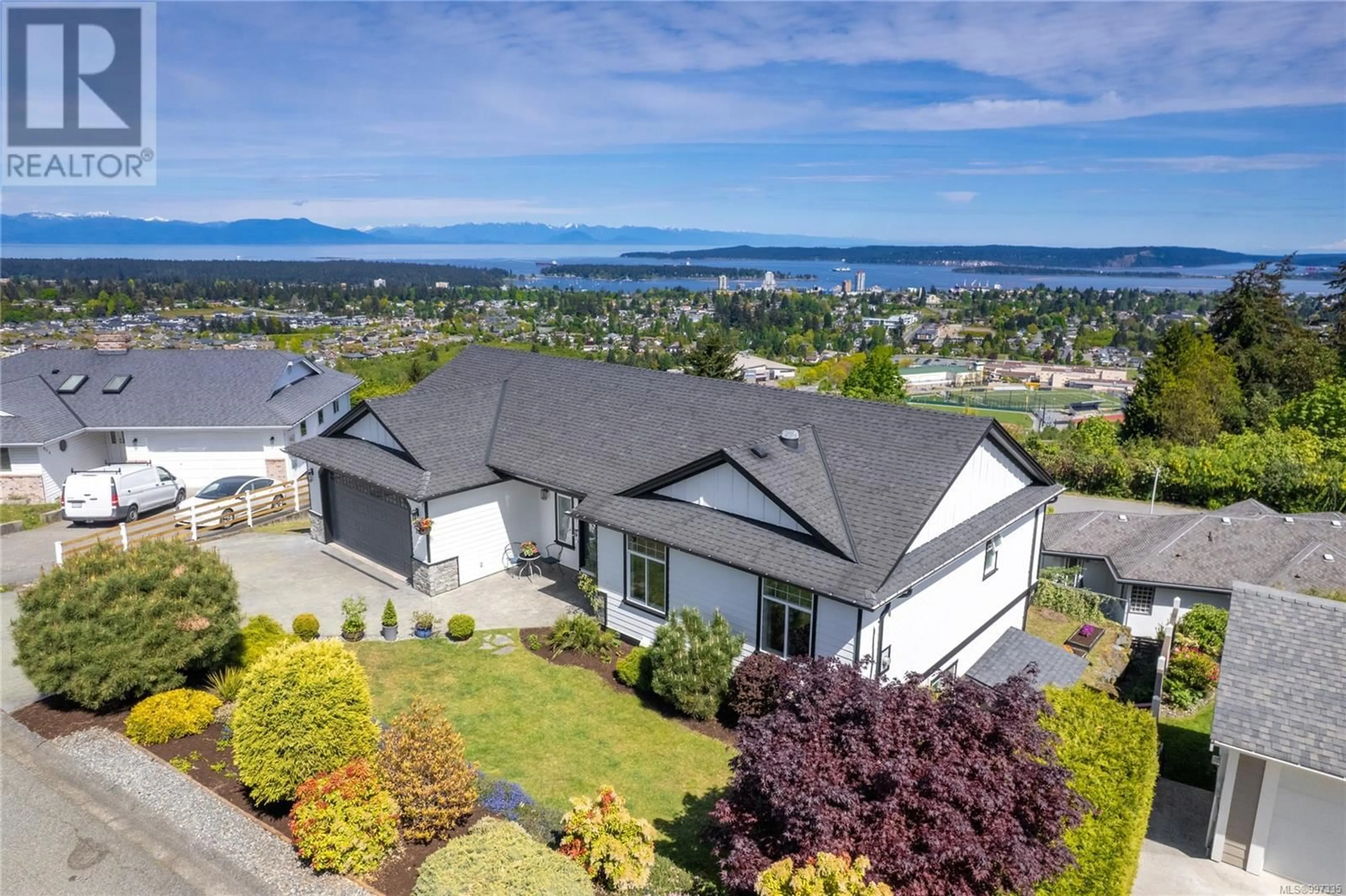 A pic from outside/outdoor area/front of a property/back of a property/a pic from drone, mountain view for 210 CONCORDIA PLACE, Nanaimo British Columbia V9R6A9
