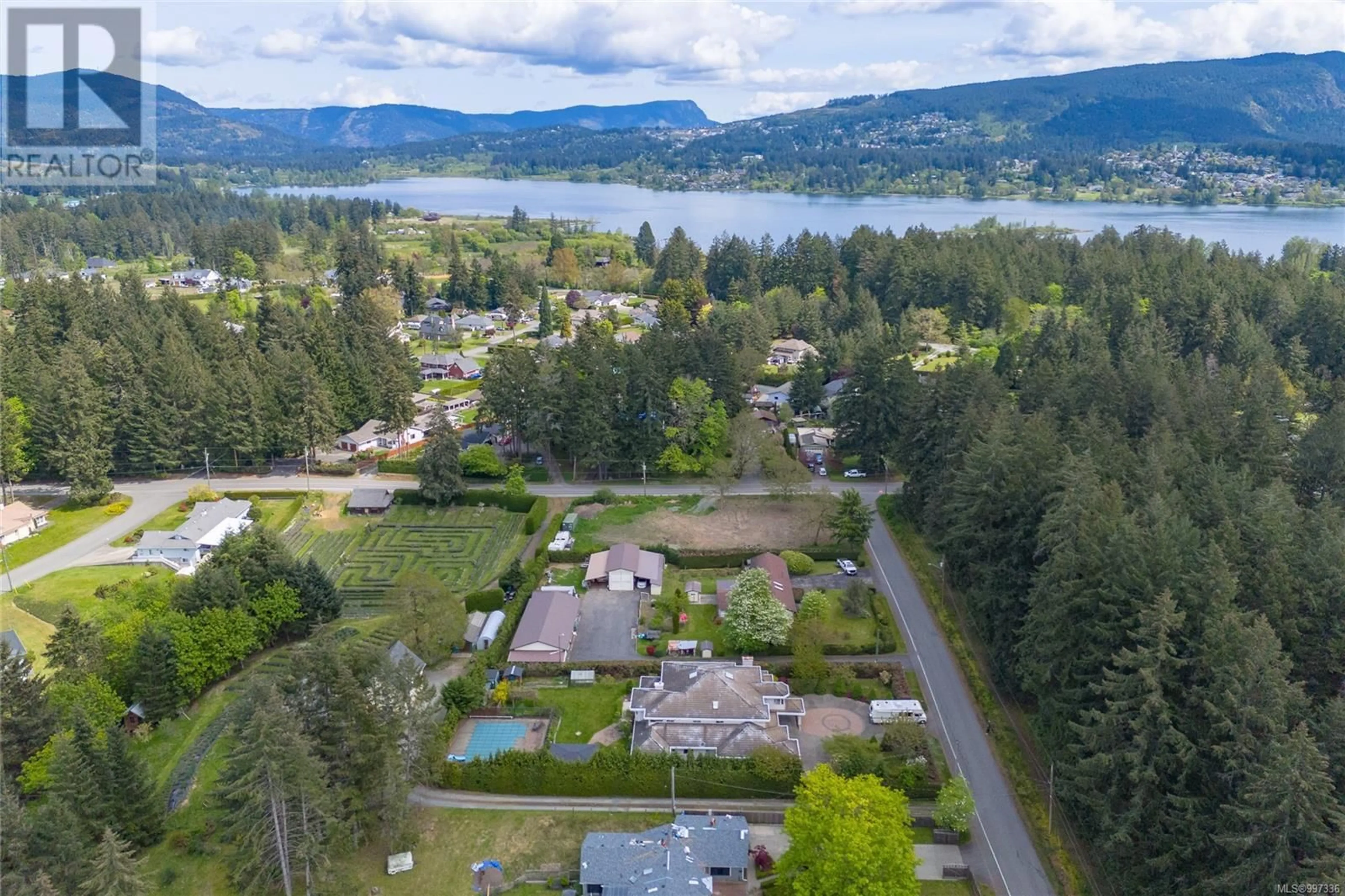 A pic from outside/outdoor area/front of a property/back of a property/a pic from drone, water/lake/river/ocean view for 2343 INVERARITY ROAD, Duncan British Columbia V9L4K1