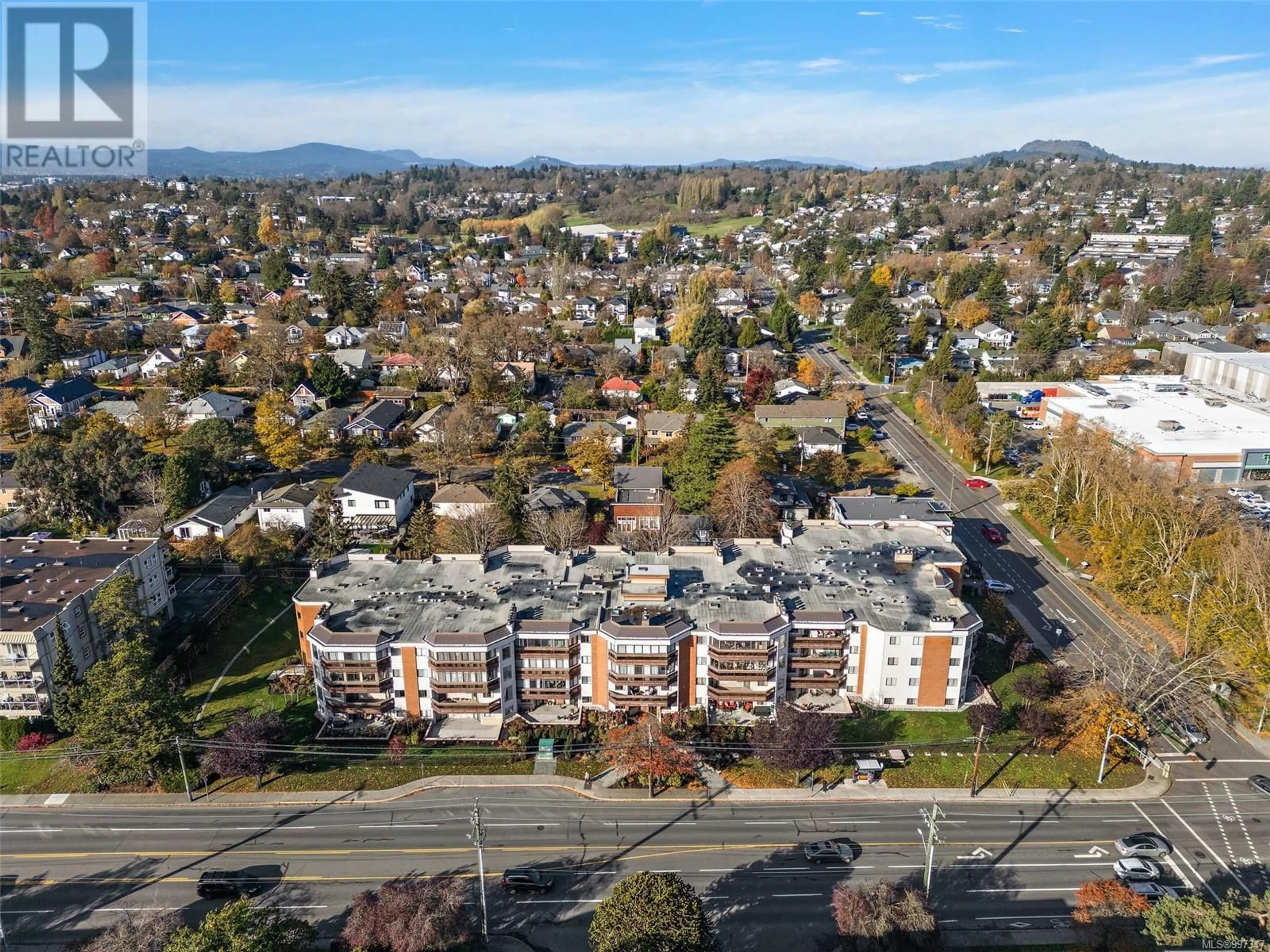 A pic from outside/outdoor area/front of a property/back of a property/a pic from drone, mountain view for 105 - 1560 HILLSIDE AVENUE, Victoria British Columbia V8T5B8