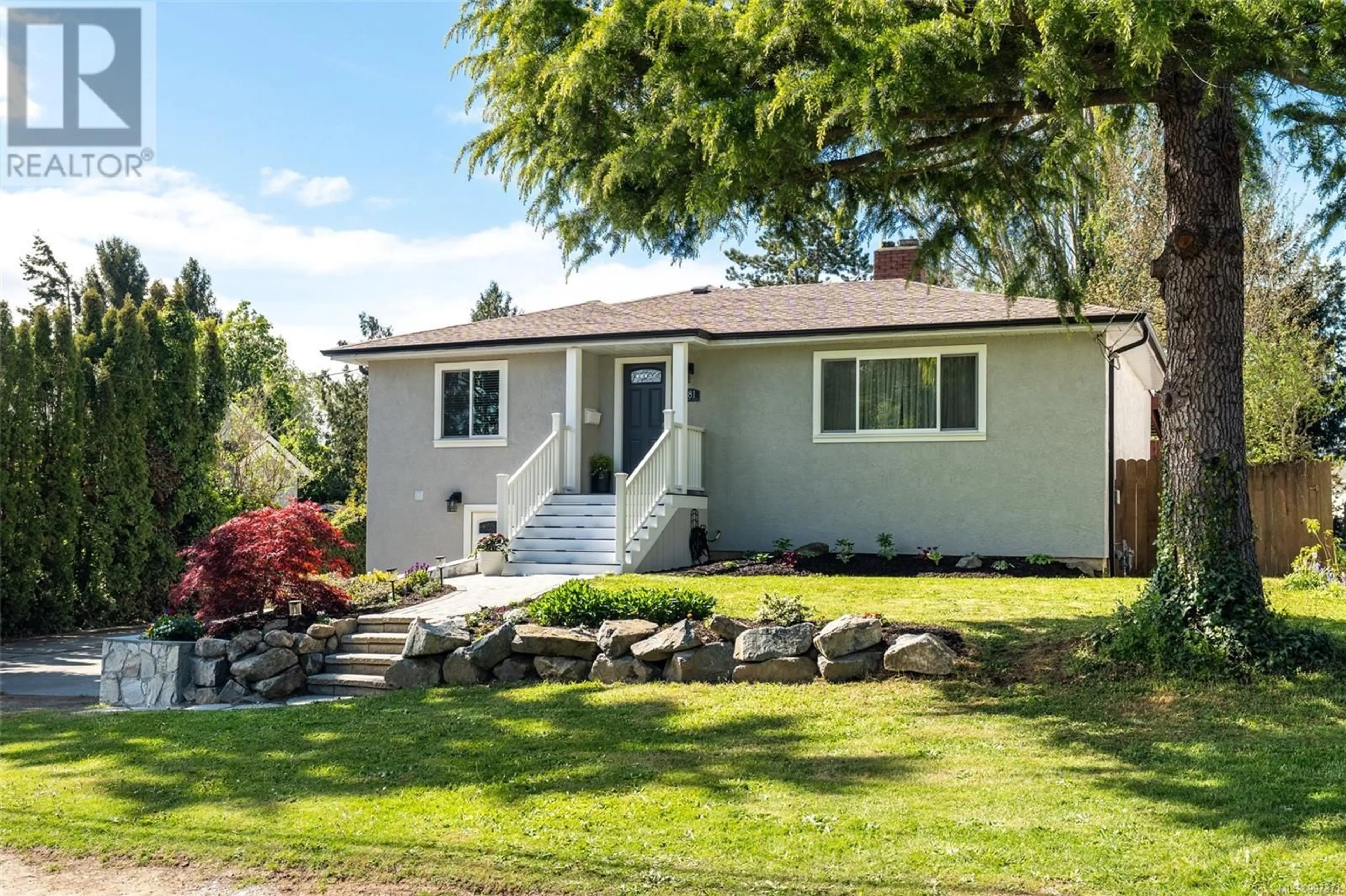 Home with vinyl exterior material, street for 881 SNOWDROP AVENUE, Saanich British Columbia V8Z2N5