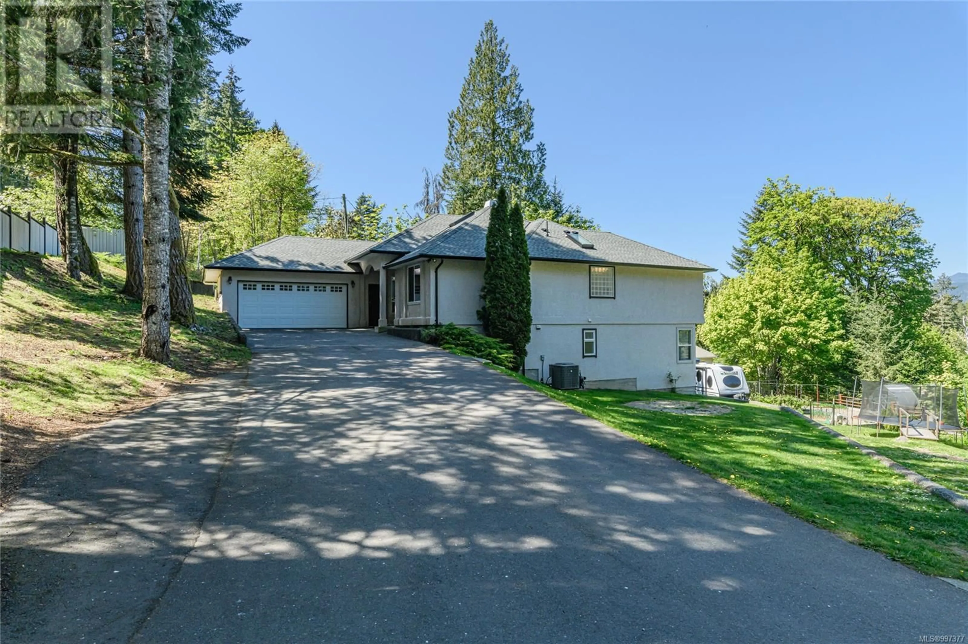A pic from outside/outdoor area/front of a property/back of a property/a pic from drone, street for 4011 CAMBRAI ROAD, Duncan British Columbia V9L6G1