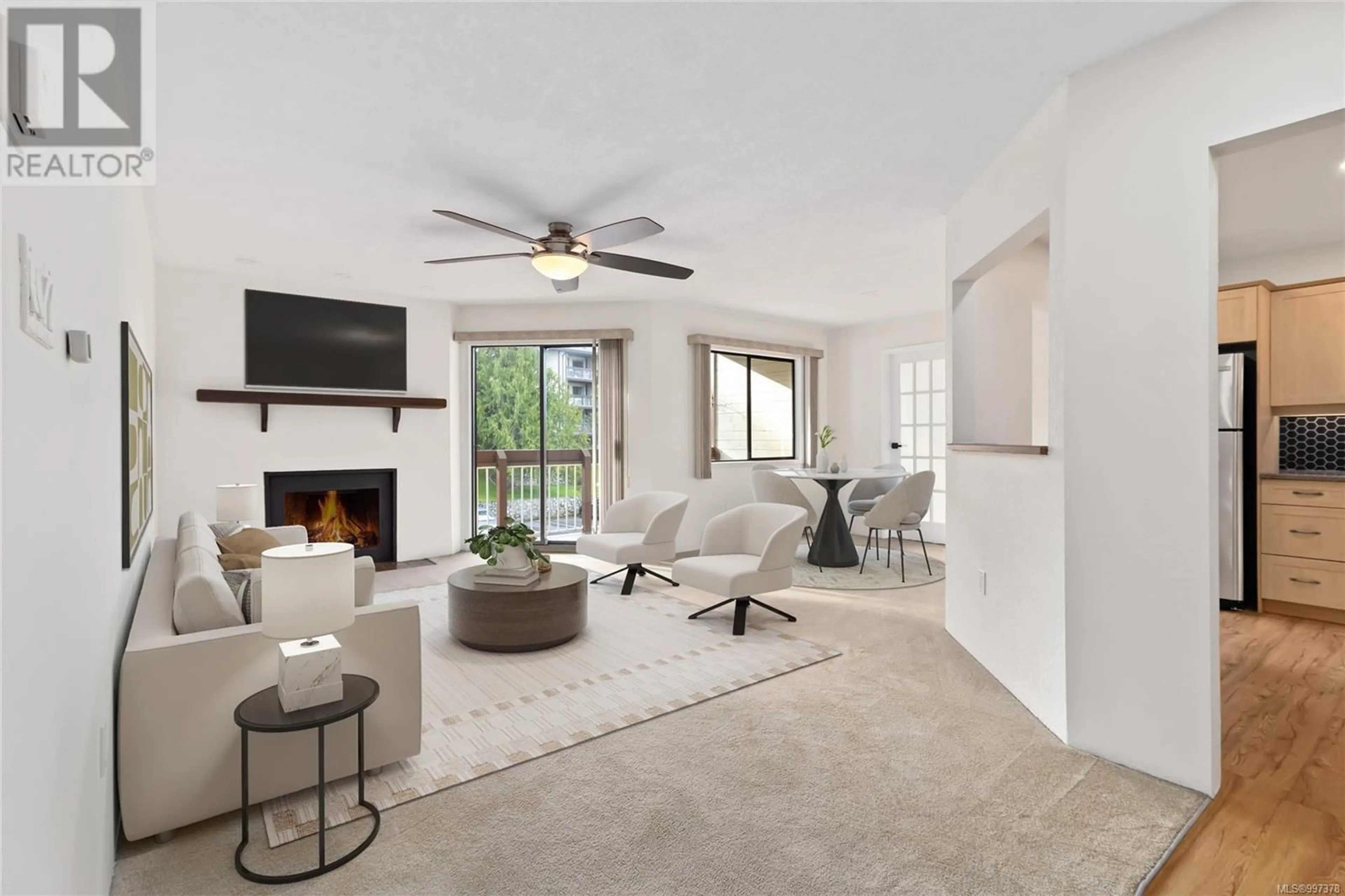 Living room with furniture, ceramic/tile floor for 410 - 71 GORGE ROAD WEST, Saanich British Columbia V9A1L9
