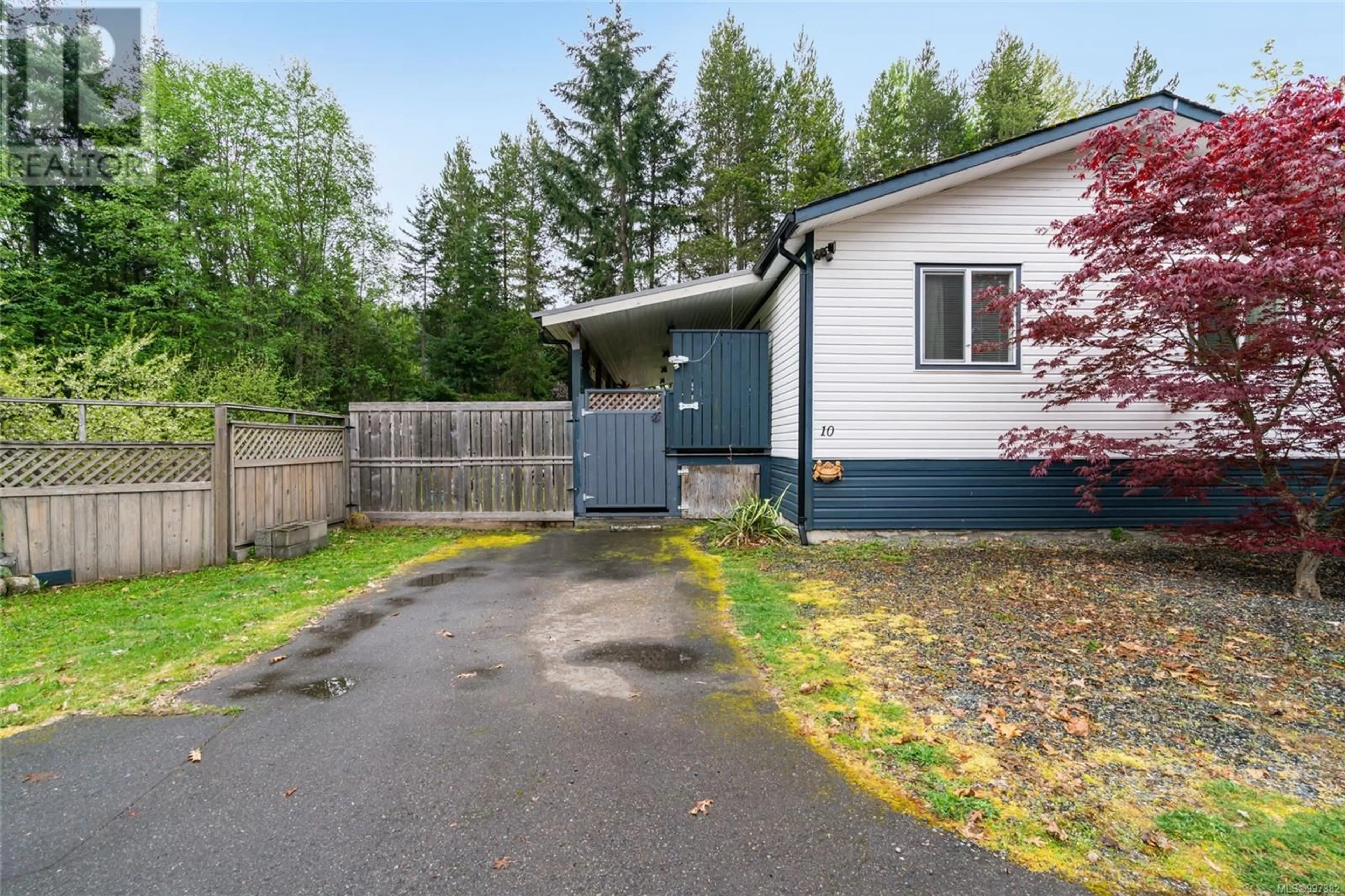 Home with vinyl exterior material, street for 10 - 2100 ERRINGTON ROAD, Errington British Columbia V0R1V0
