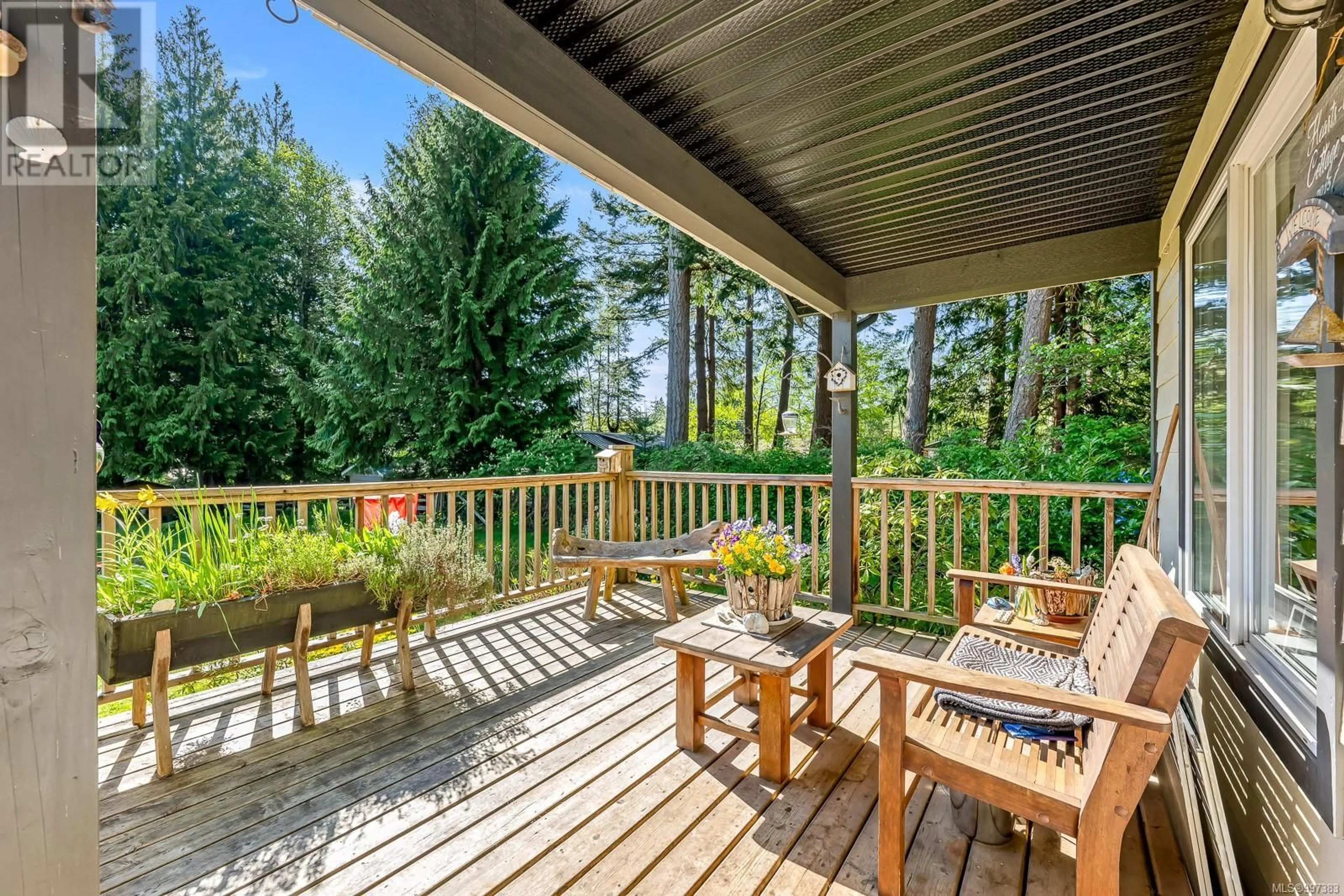 Patio, forest/trees view for 1495 BAIKIE ROAD, Denman Island British Columbia V0R1T0