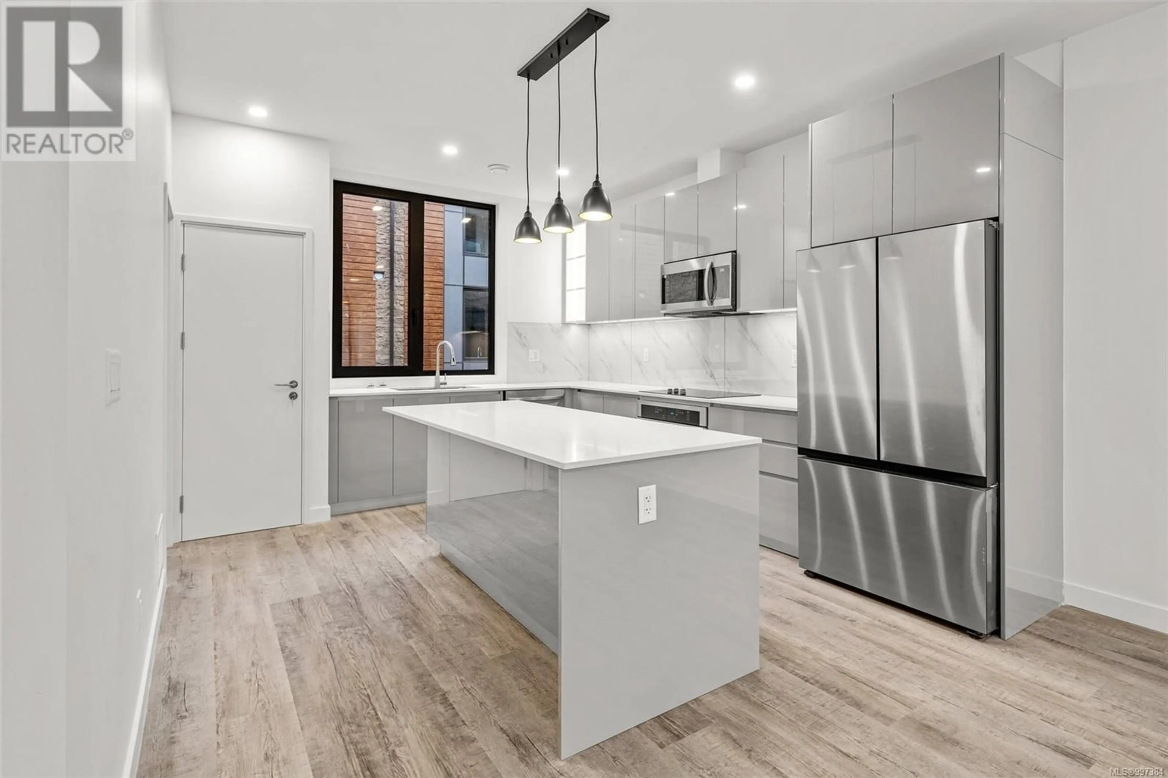Open concept kitchen, unknown for 109 - 2841 KNOTTY PINE ROAD, Langford British Columbia V9B3Z2