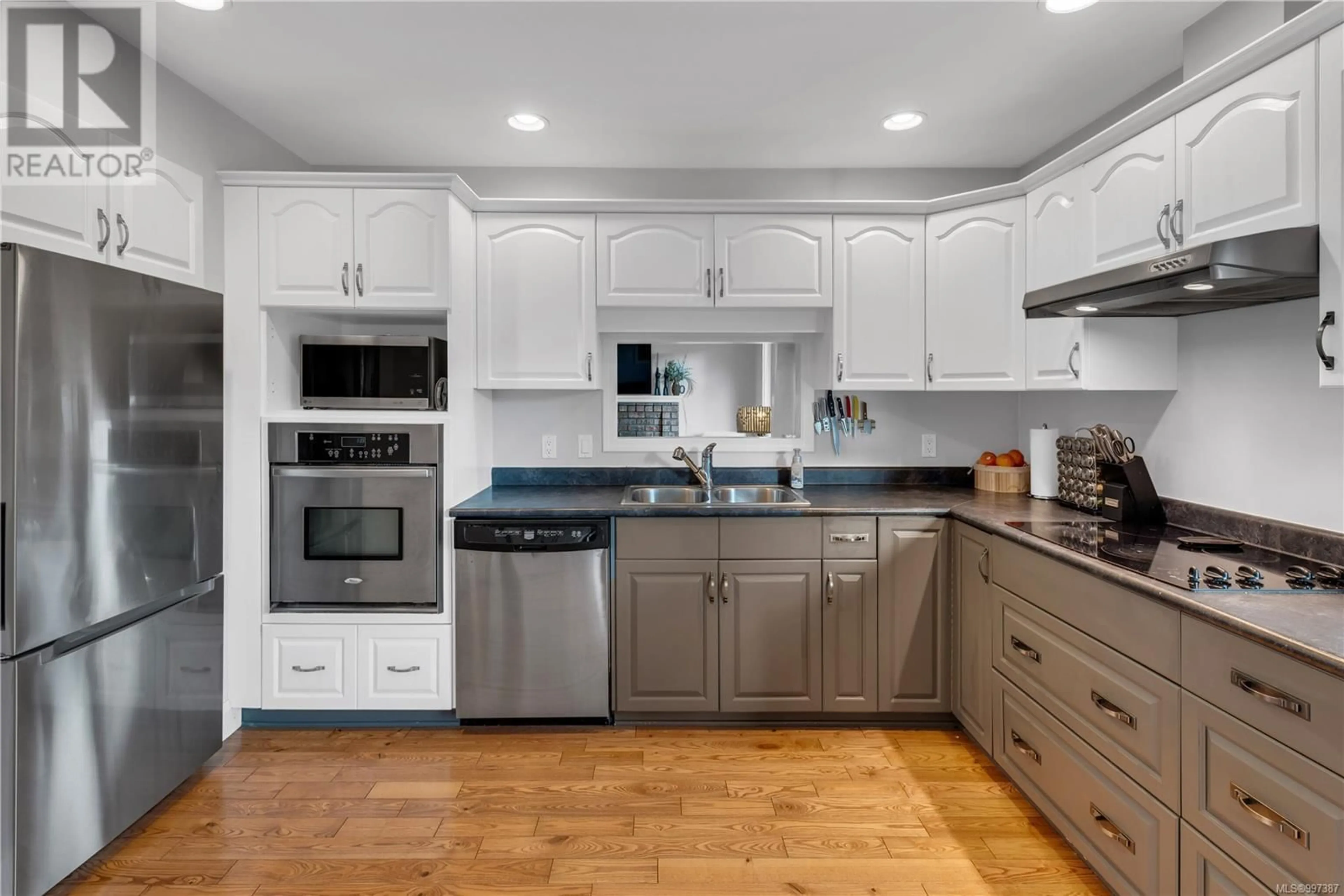Open concept kitchen, ceramic/tile floor for 3016 DYSART ROAD, Saanich British Columbia V9A2K2
