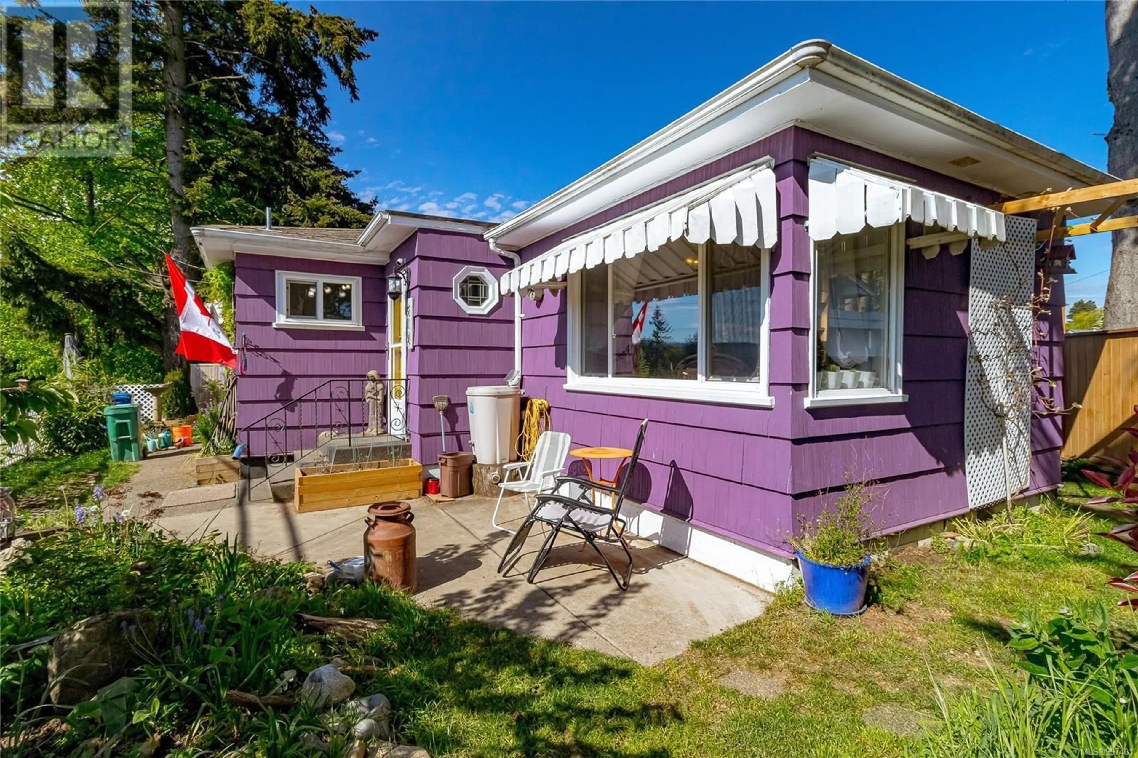 Home with vinyl exterior material, street for 310 HAREWOOD ROAD, Nanaimo British Columbia V9R2Z2