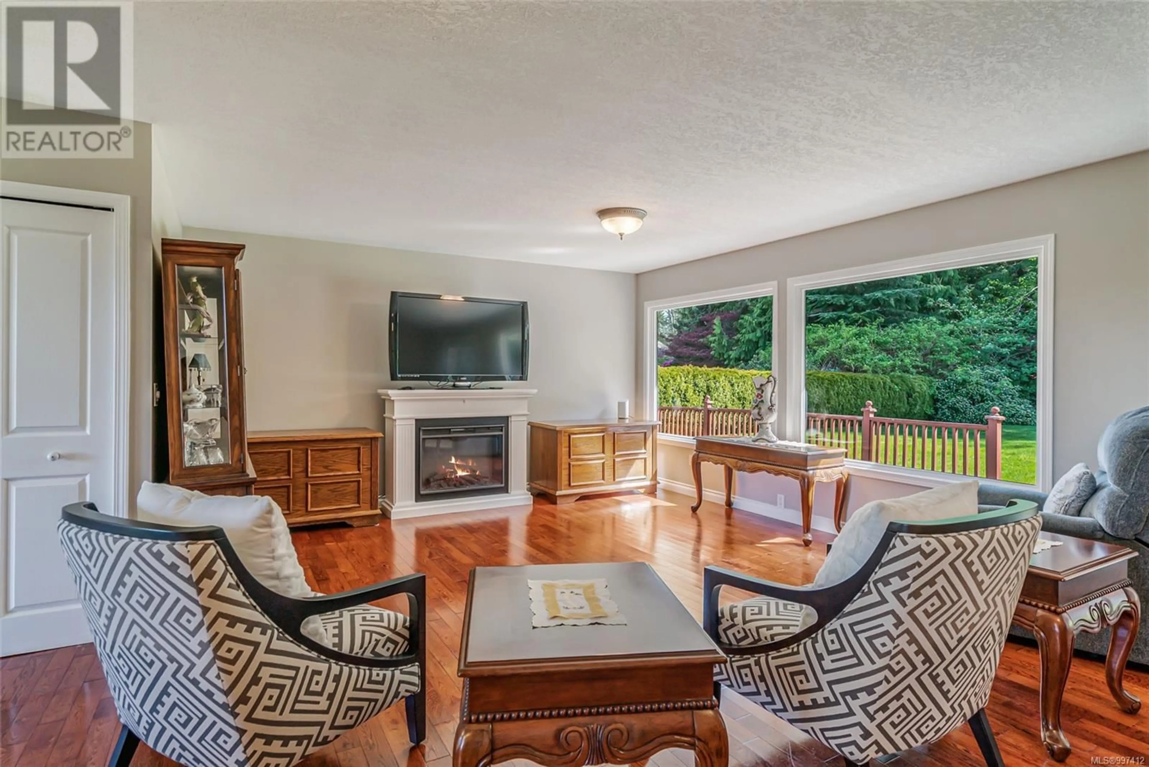 Living room with furniture, unknown for 1310 LANYON DRIVE, Parksville British Columbia V9P1W6