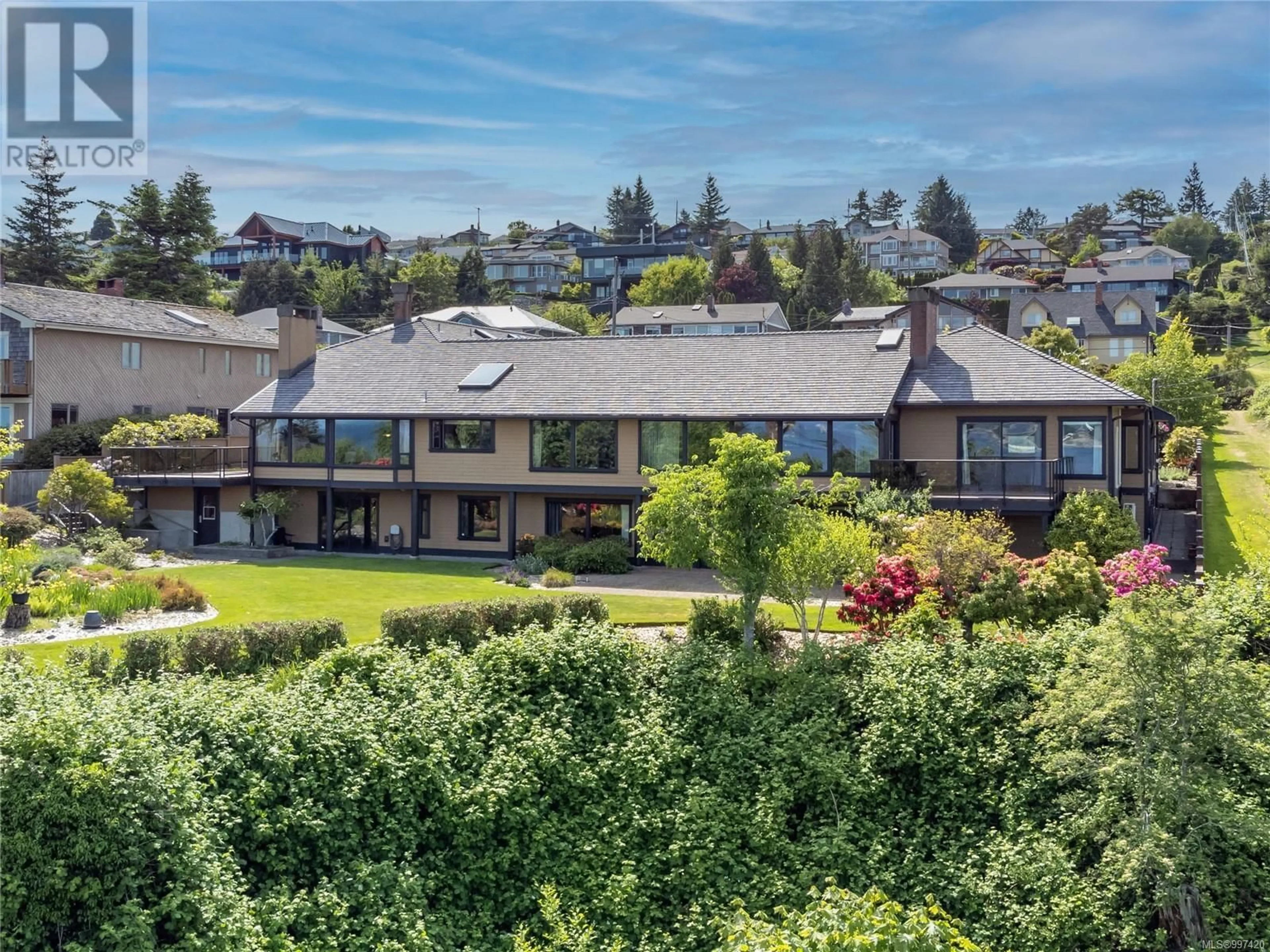 A pic from outside/outdoor area/front of a property/back of a property/a pic from drone, mountain view for 415 CARNEGIE STREET, Campbell River British Columbia V9W6N5