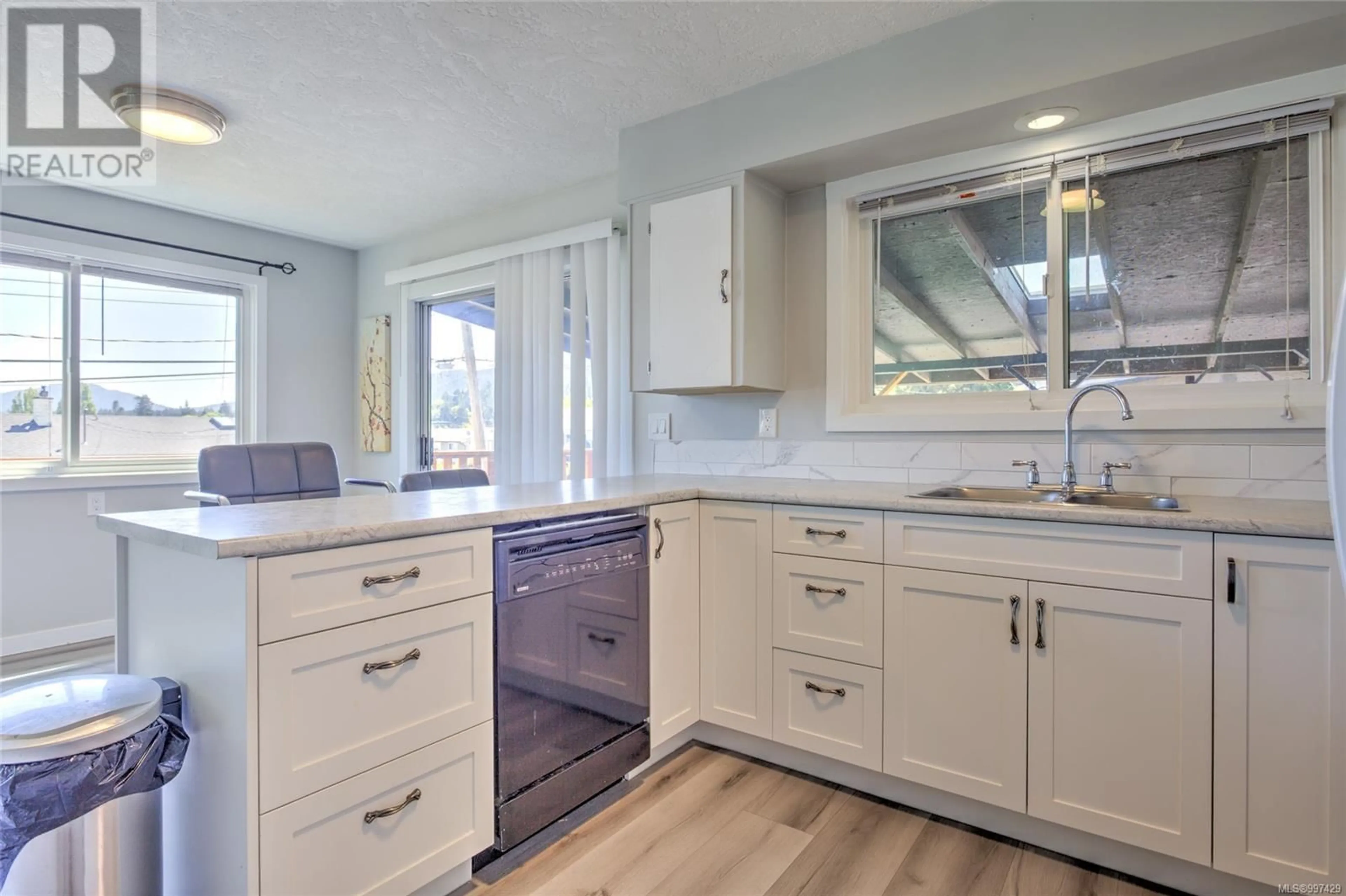 Open concept kitchen, ceramic/tile floor for 8054 BERTHA STREET, Crofton British Columbia V0R1R0