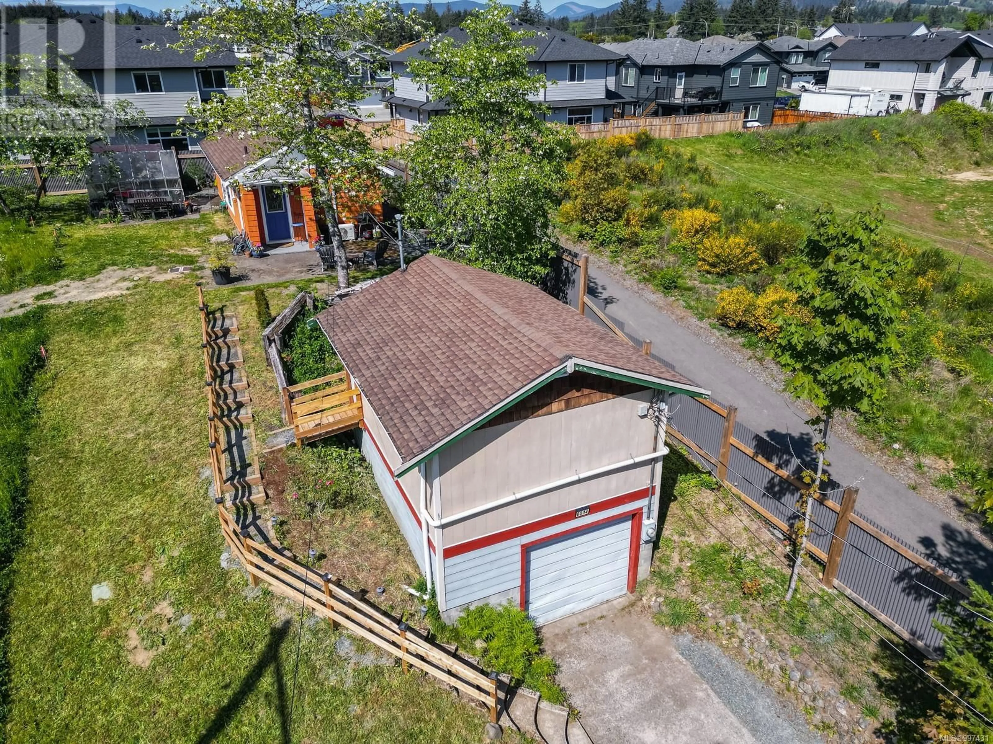 A pic from outside/outdoor area/front of a property/back of a property/a pic from drone, street for 6014 CASSINO ROAD, Duncan British Columbia V9L4G5