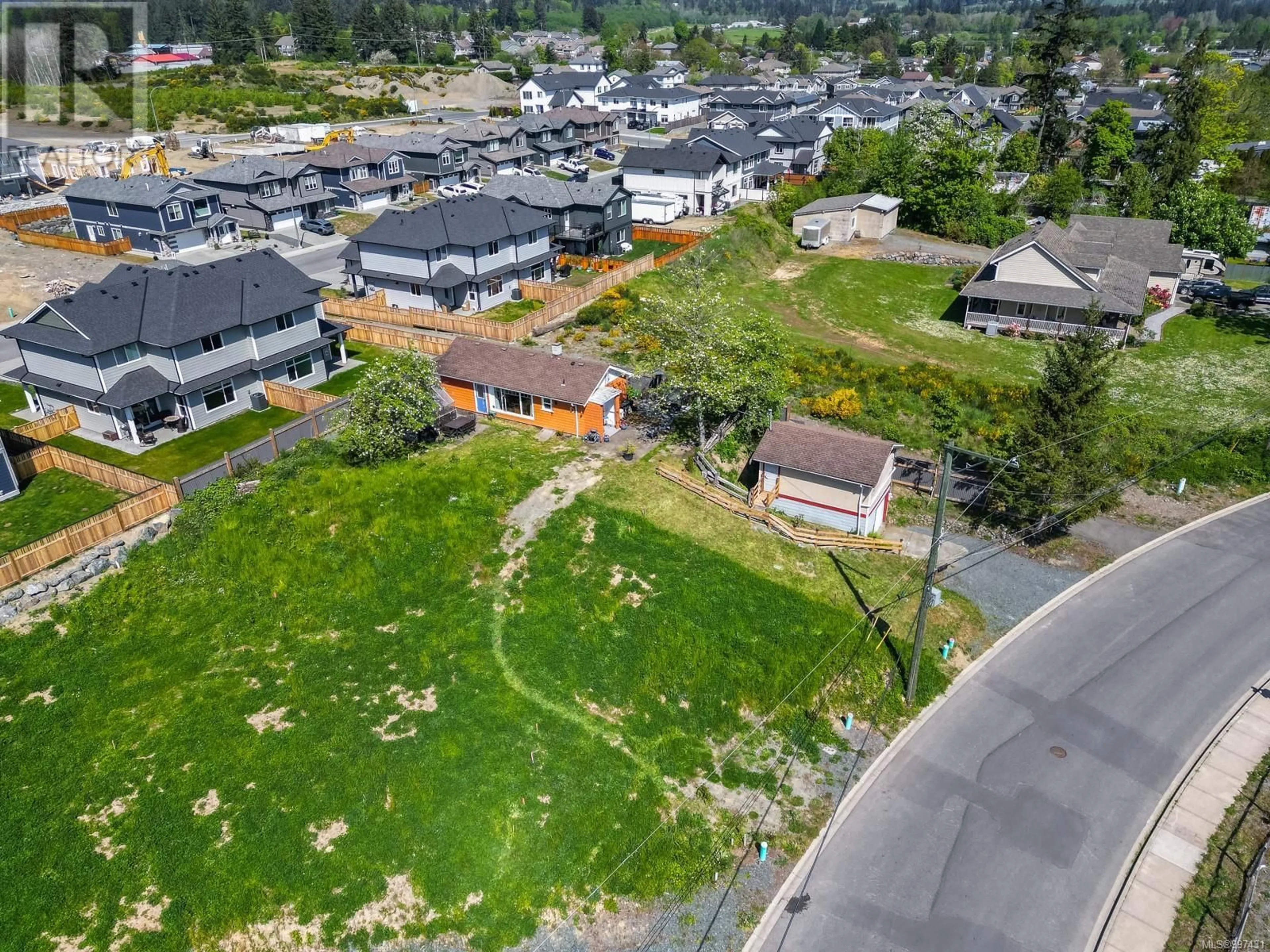 A pic from outside/outdoor area/front of a property/back of a property/a pic from drone, street for 6014 CASSINO ROAD, Duncan British Columbia V9L4G5