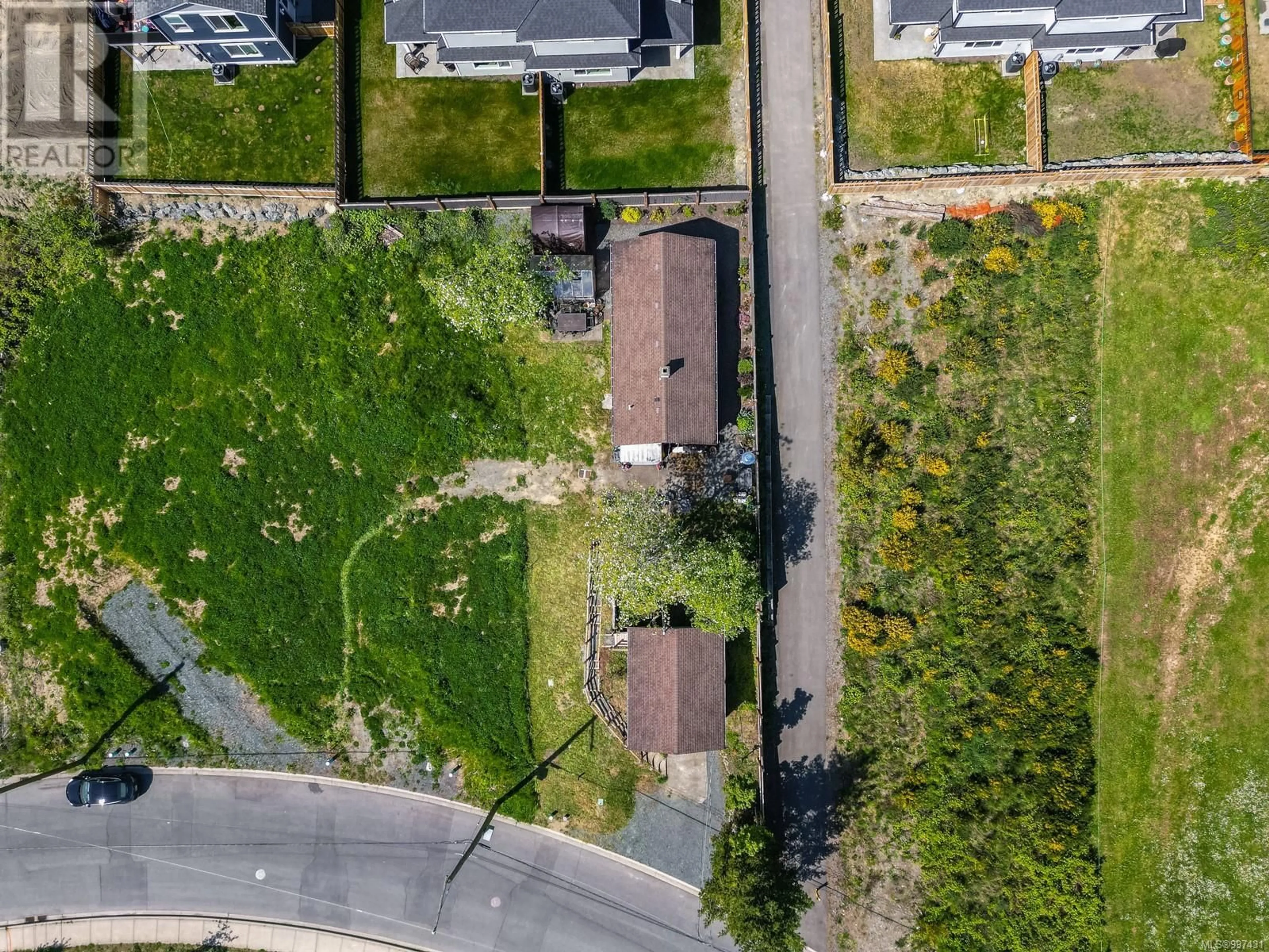 A pic from outside/outdoor area/front of a property/back of a property/a pic from drone, street for 6014 CASSINO ROAD, Duncan British Columbia V9L4G5