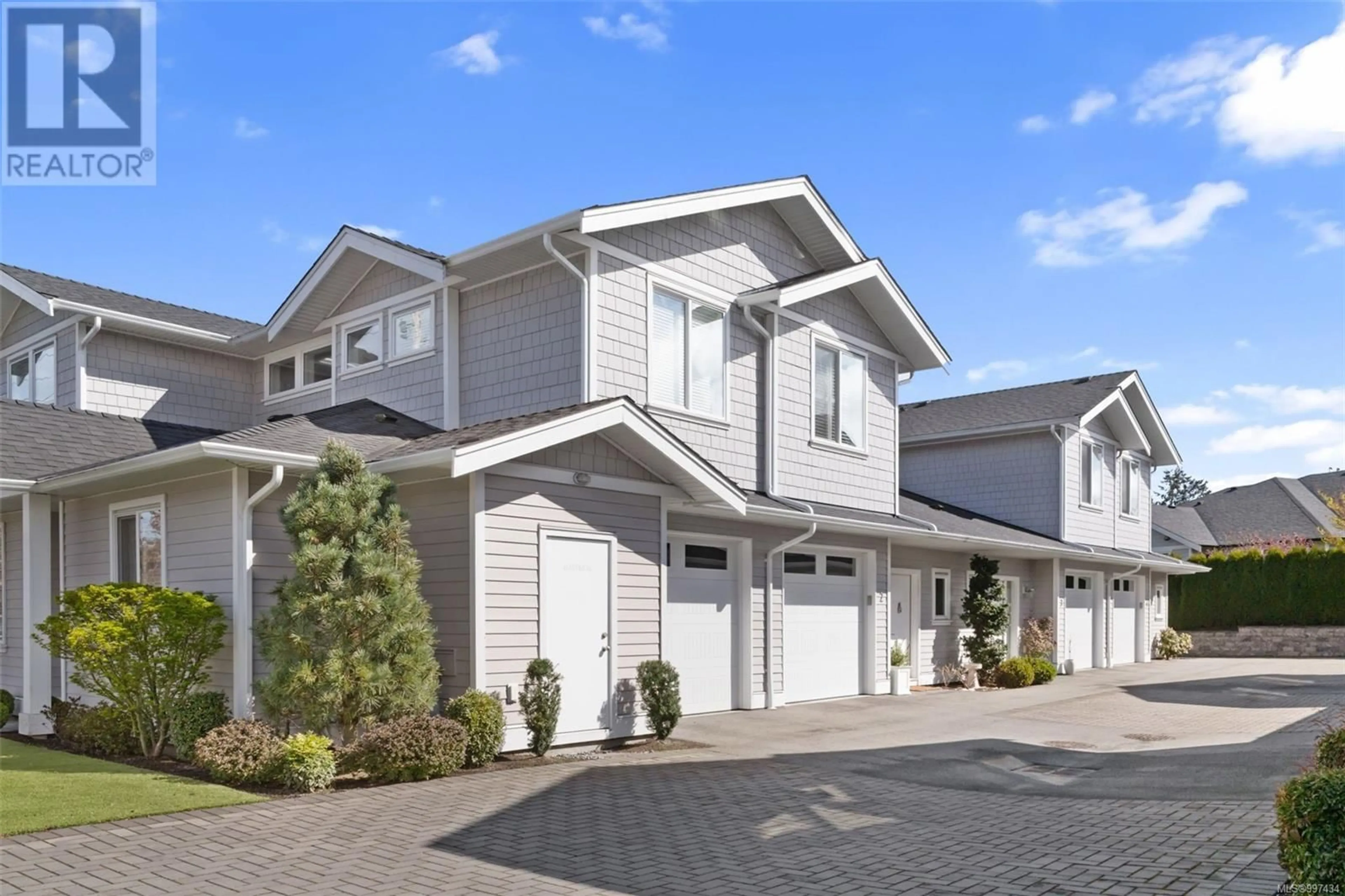 Home with vinyl exterior material, street for 2 - 10490 RESTHAVEN DRIVE, Sidney British Columbia V8L3H7