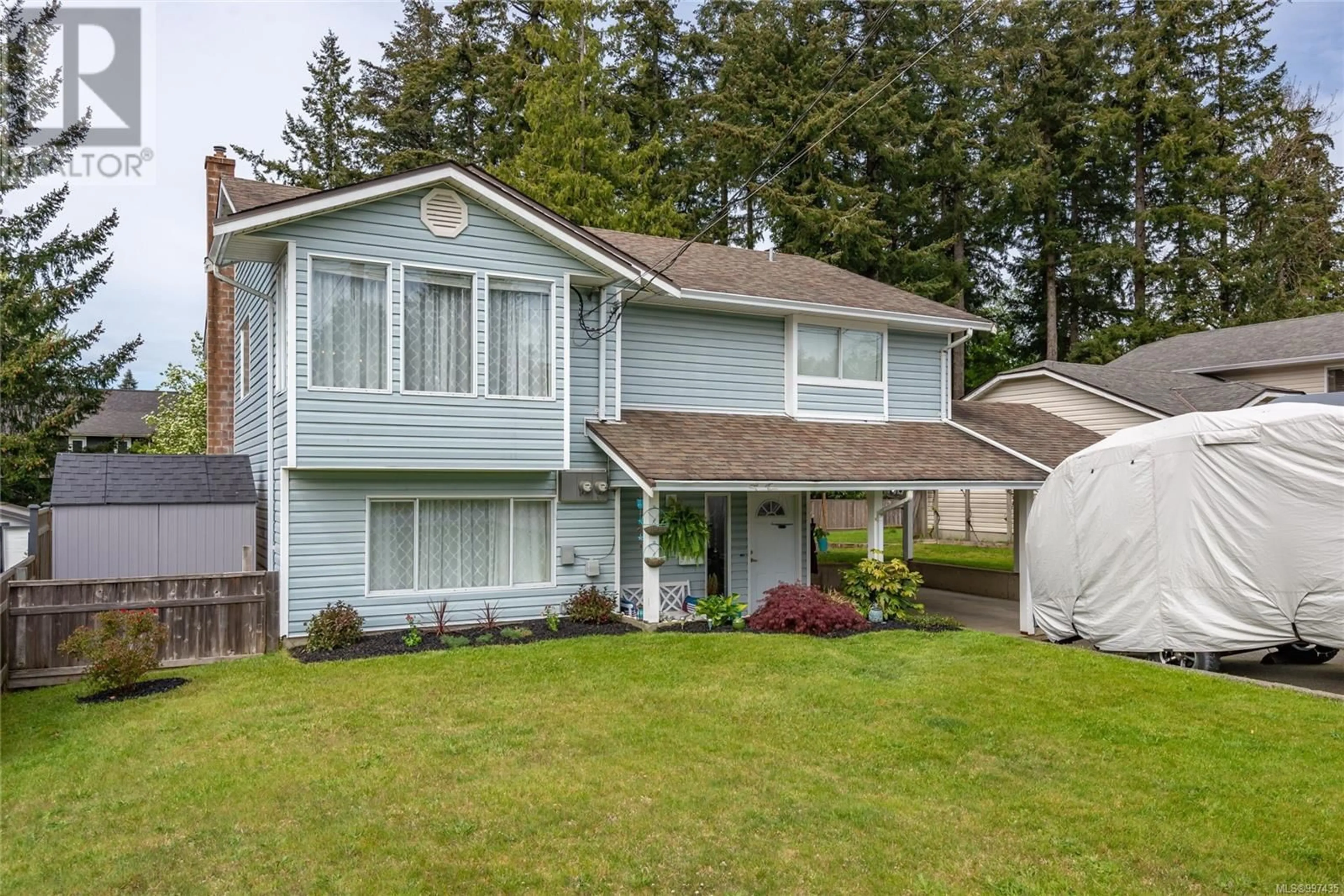 Home with vinyl exterior material, street for 420 MCPHEDRAN ROAD SOUTH, Campbell River British Columbia V9W5K4
