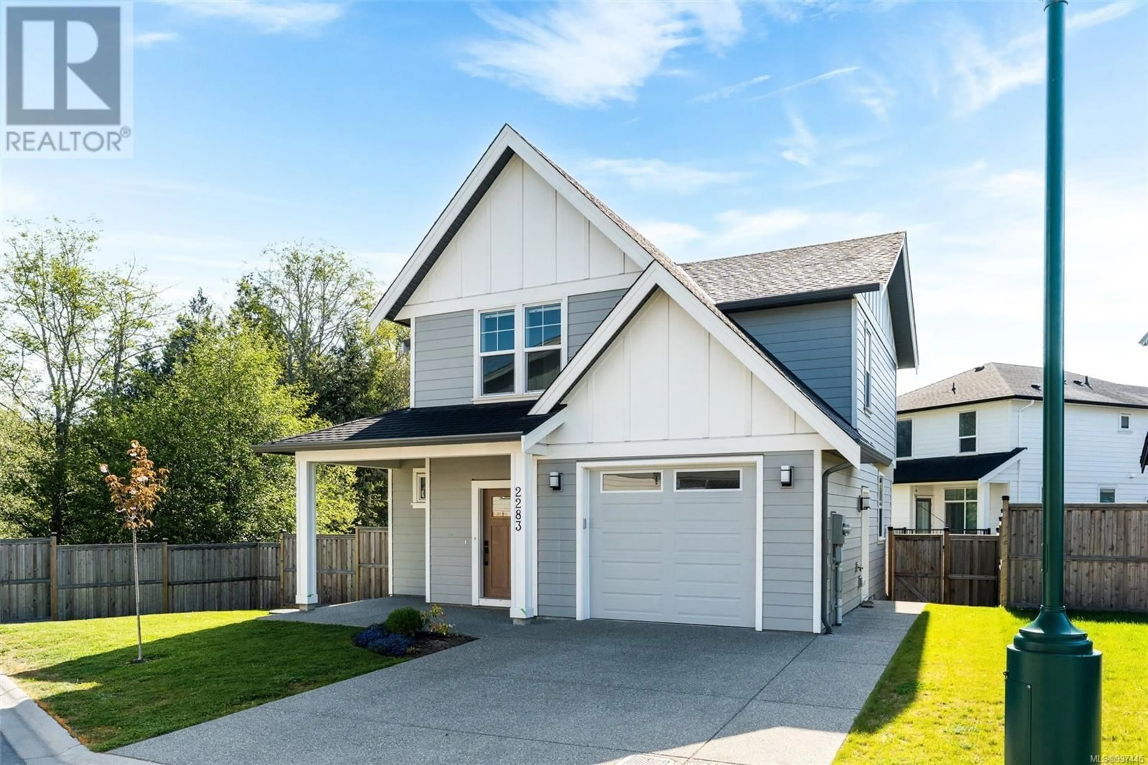 Home with vinyl exterior material, street for 2283 EVELYN LANE, Sooke British Columbia V9Z0W3