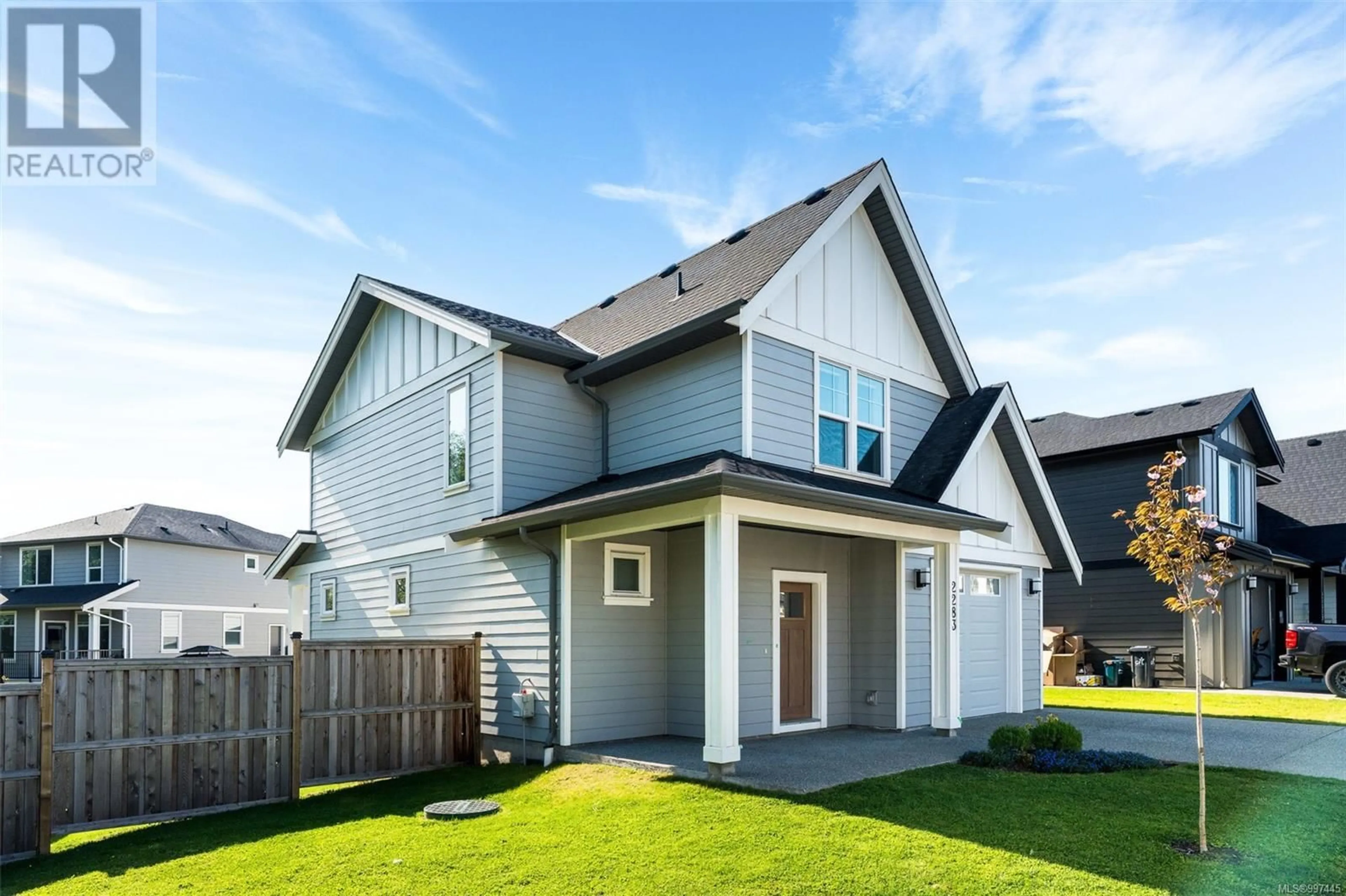 Home with vinyl exterior material, street for 2283 EVELYN LANE, Sooke British Columbia V9Z0W3