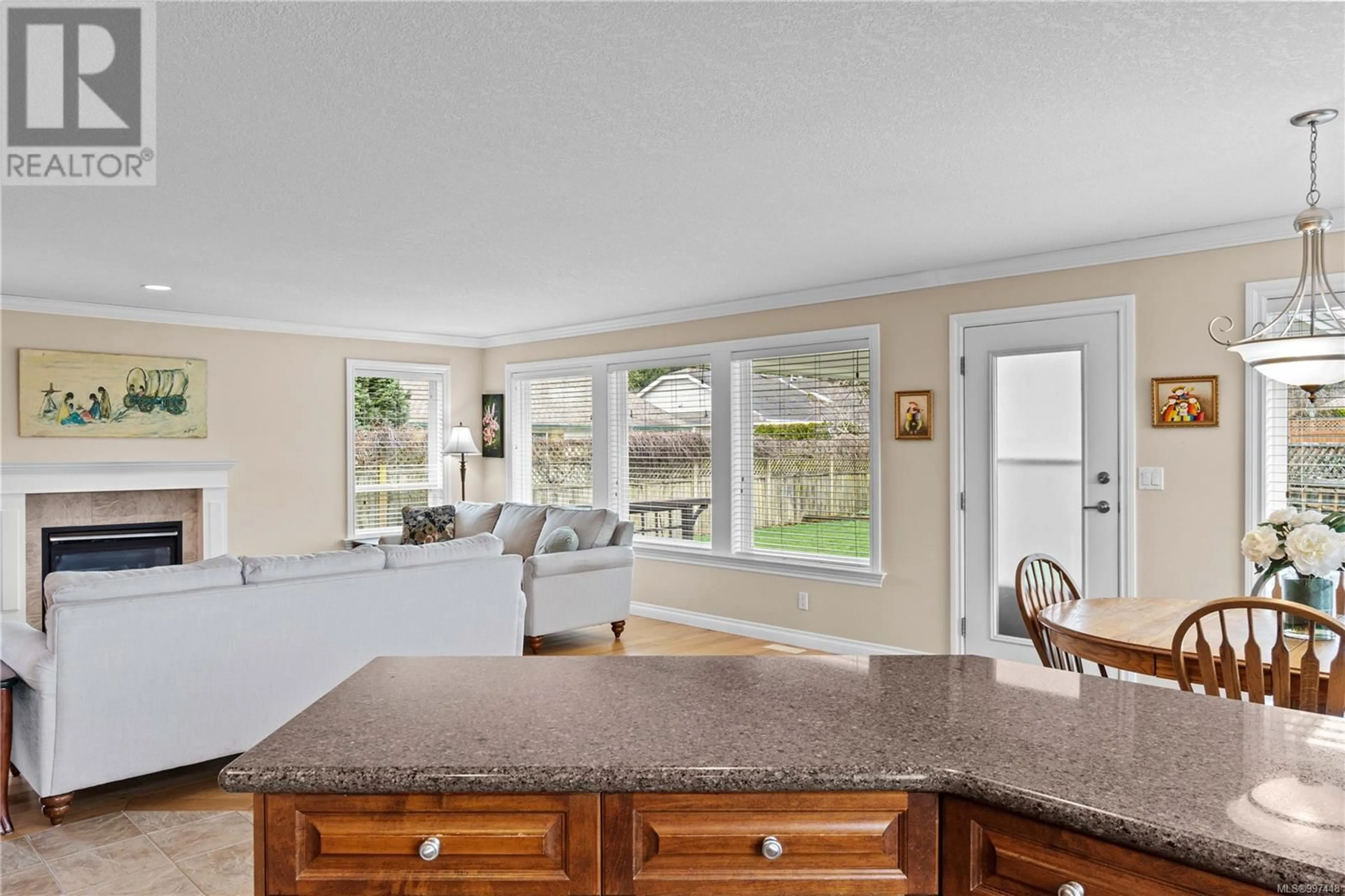 Open concept kitchen, ceramic/tile floor for 696 LYNX PLACE, Qualicum Beach British Columbia V9K2P3