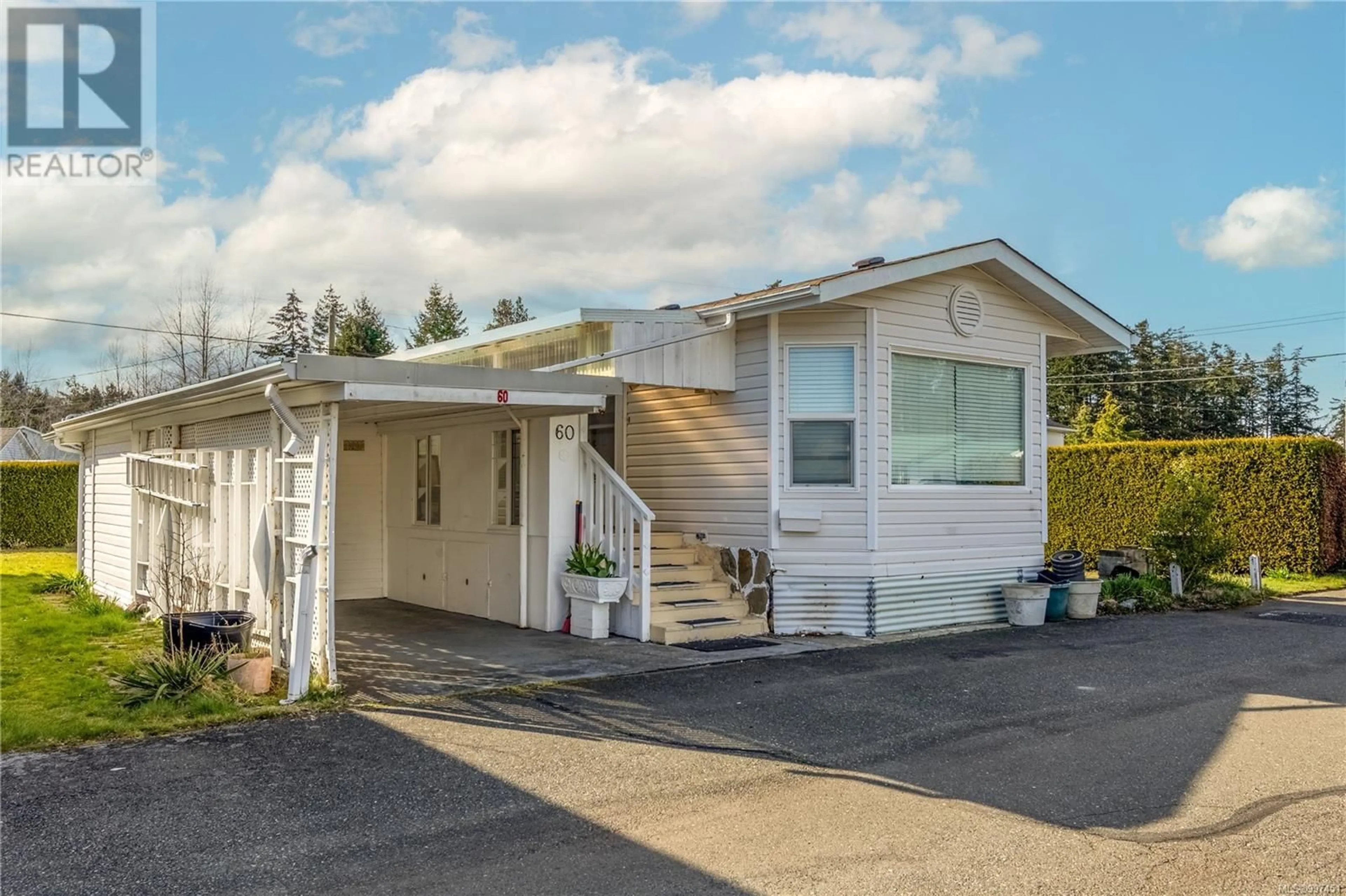 Home with vinyl exterior material, street for 60 - 1240 WILKINSON ROAD, Comox British Columbia V9M3X8