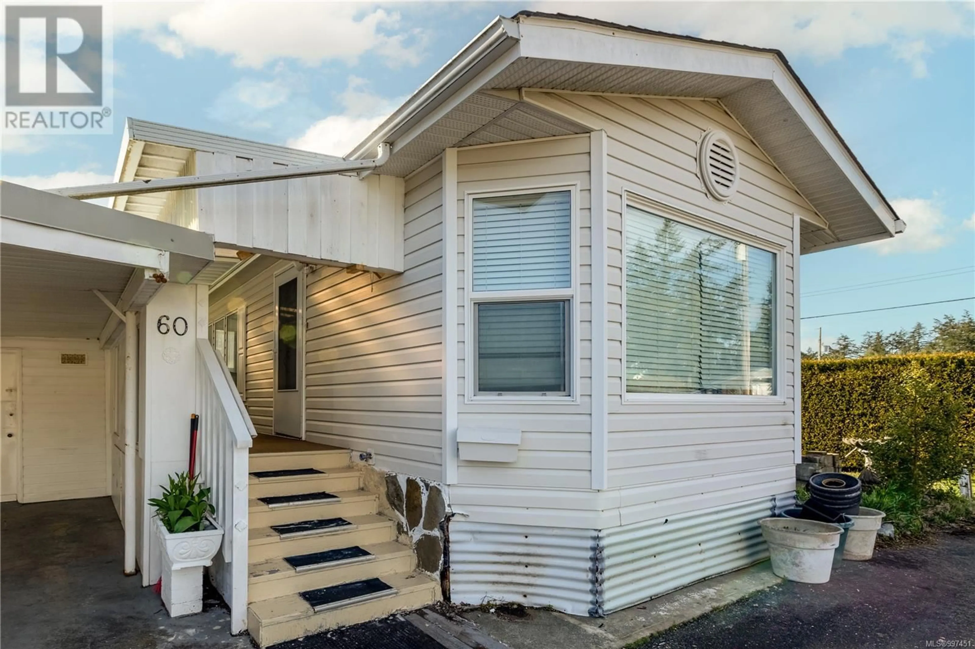 Home with vinyl exterior material, street for 60 - 1240 WILKINSON ROAD, Comox British Columbia V9M3X8