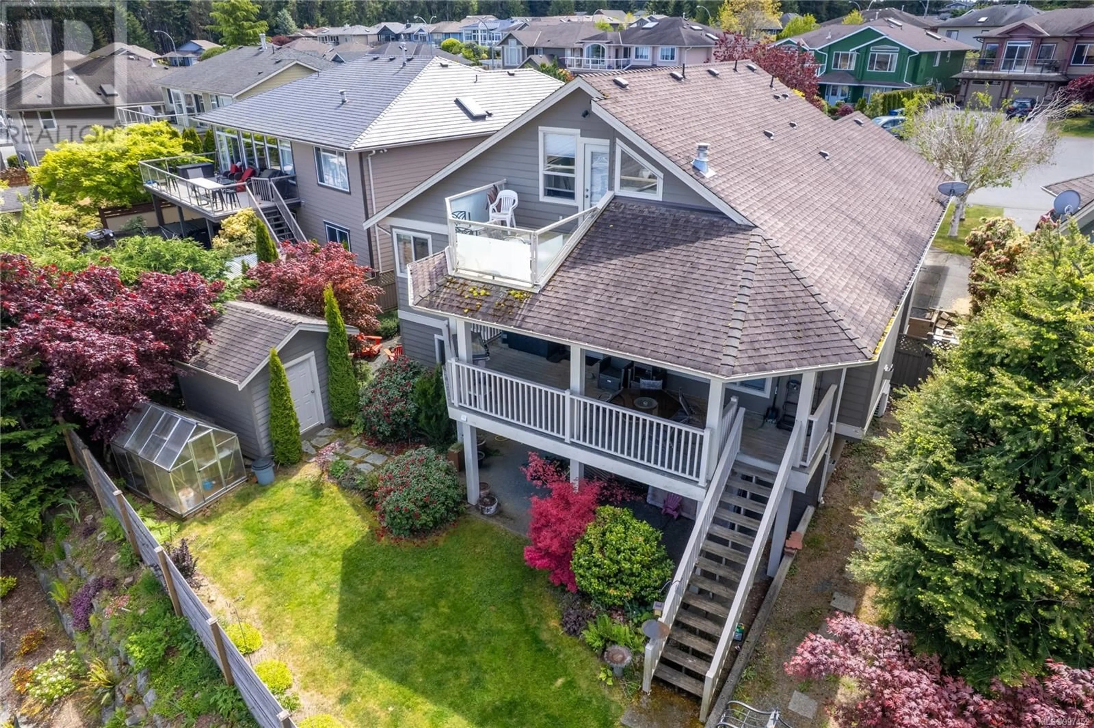 A pic from outside/outdoor area/front of a property/back of a property/a pic from drone, street for 6514 GERKE PLACE, Nanaimo British Columbia V9V1V8