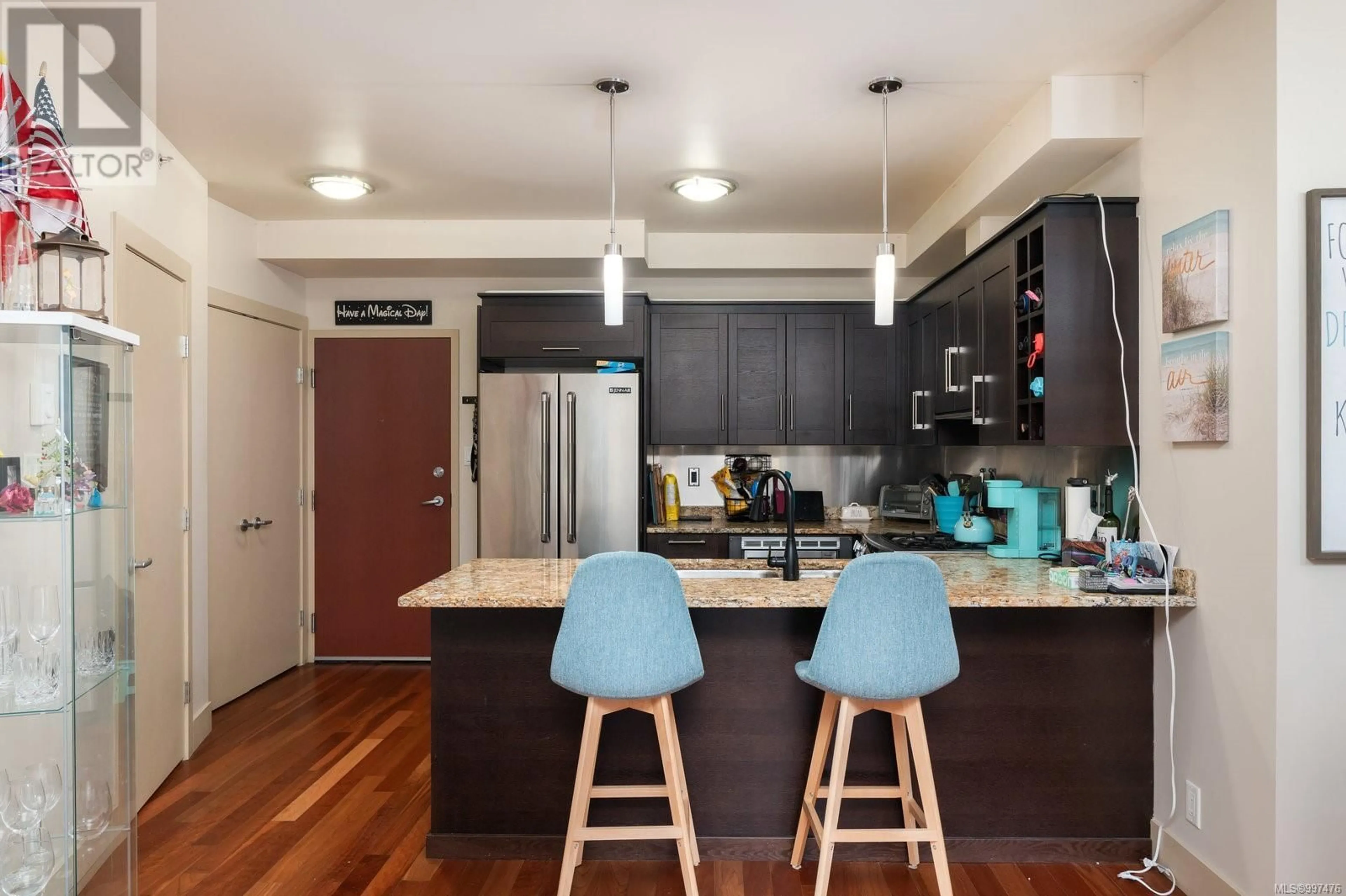 Open concept kitchen, wood/laminate floor for S204 - 737 HUMBOLDT STREET, Victoria British Columbia V8W1B1