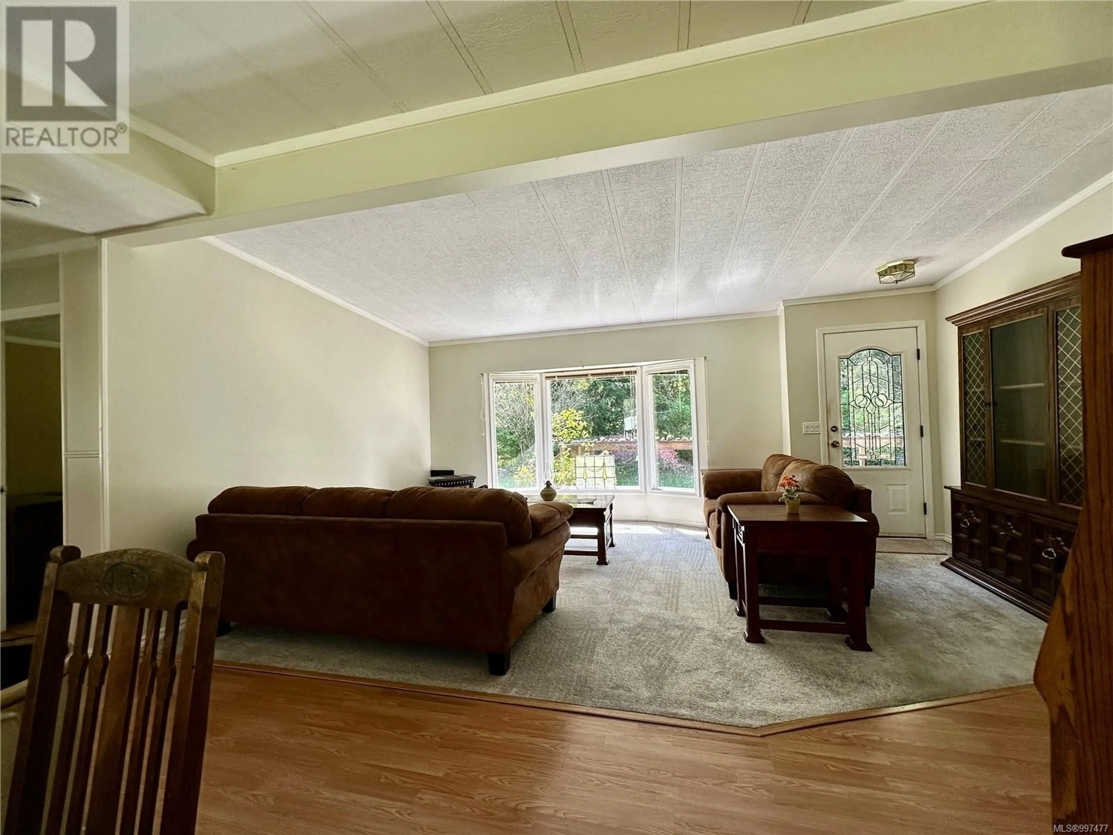 Living room with furniture, unknown for 901 NIMPKISH HEIGHTS ROAD, Hyde Creek British Columbia V0N2R0
