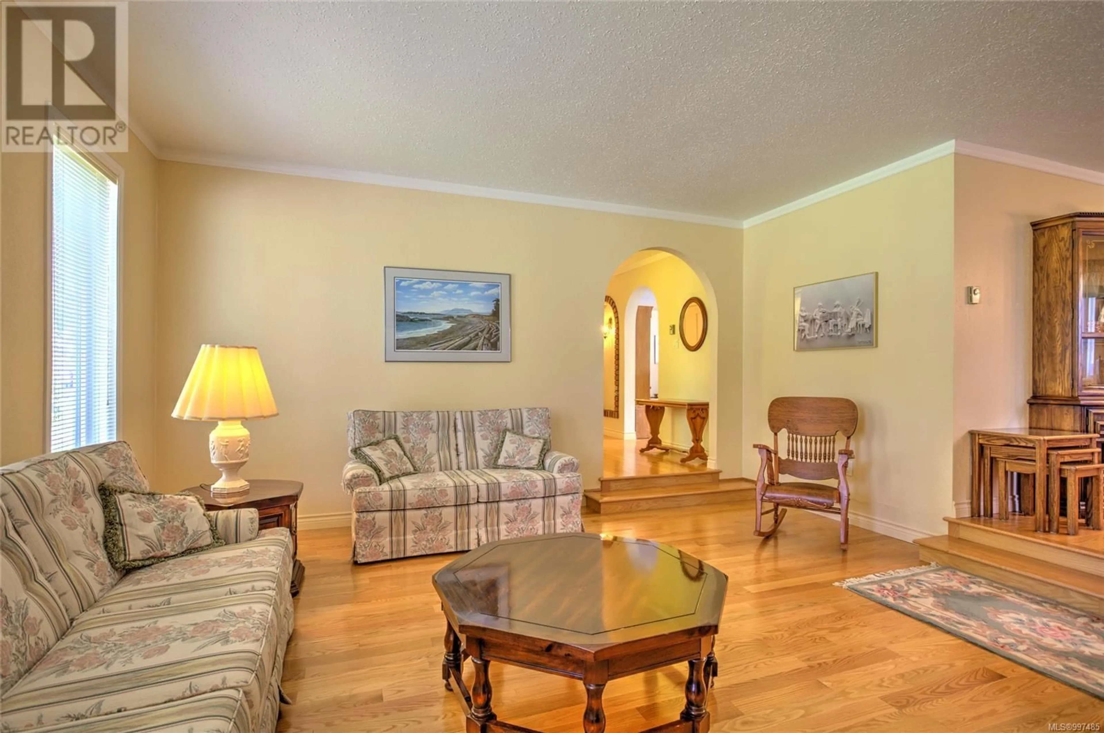 Living room with furniture, wood/laminate floor for 4725 FAIRBRIDGE DRIVE, Duncan British Columbia V9L6N8