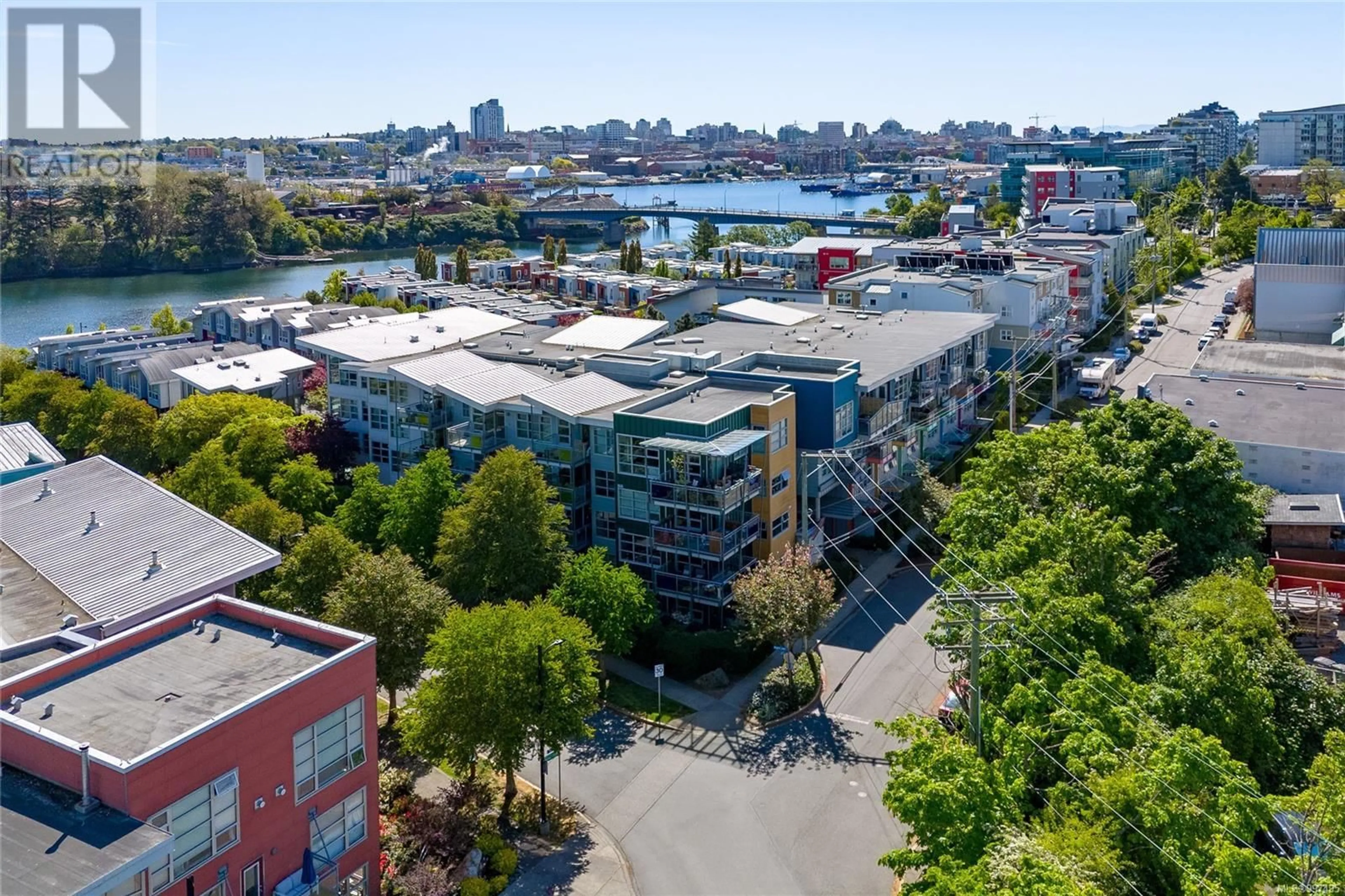 A pic from outside/outdoor area/front of a property/back of a property/a pic from drone, city buildings view from balcony for 103 - 797 TYEE ROAD, Victoria British Columbia V9A7R4
