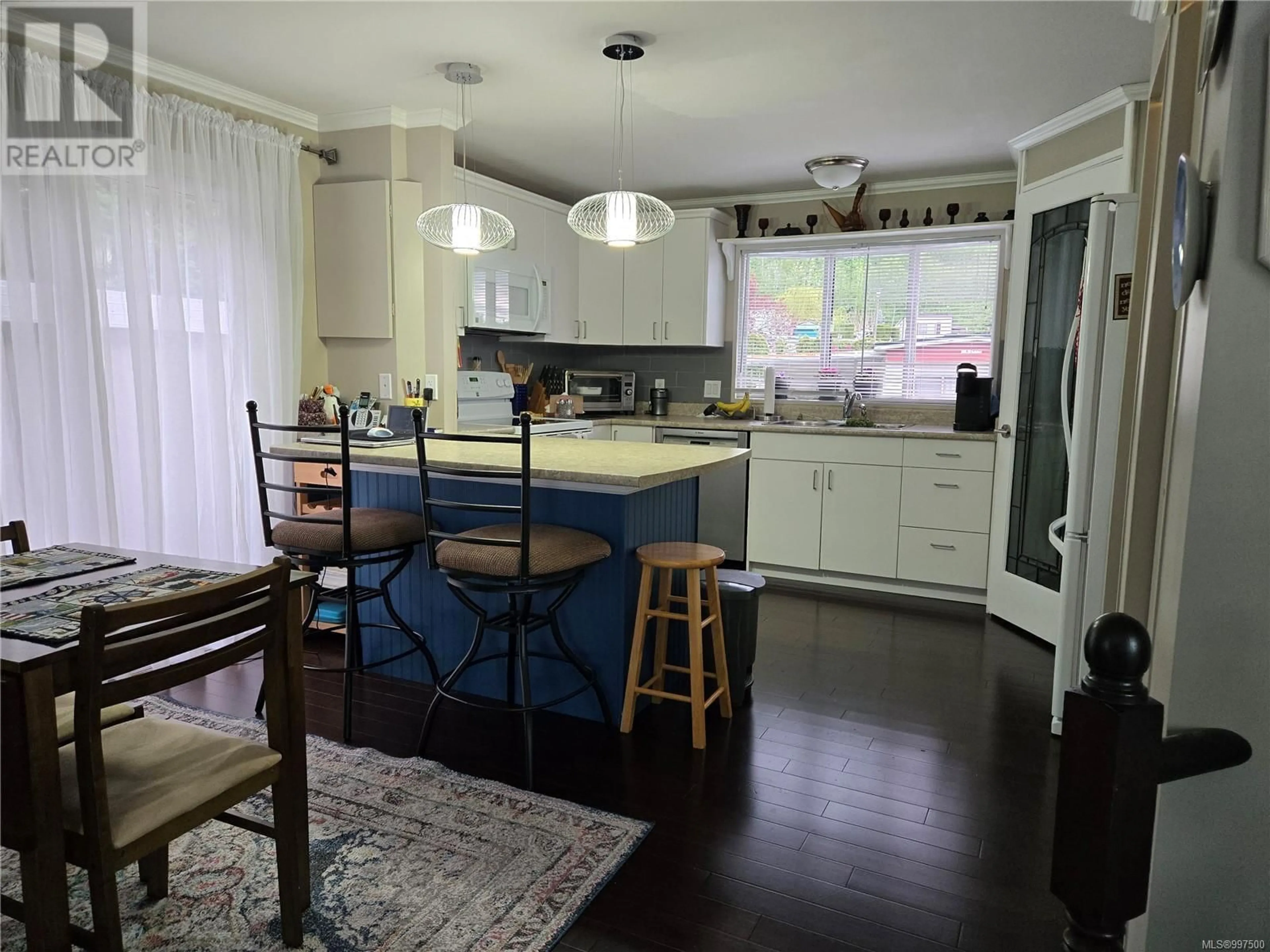 Open concept kitchen, wood/laminate floor for 41 - 951 HOMEWOOD ROAD, Campbell River British Columbia V9W3N7